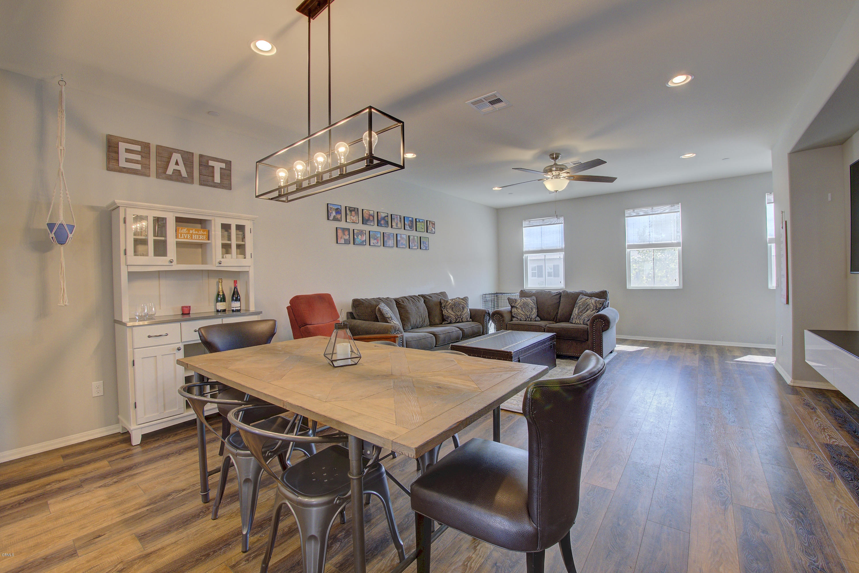 178 Prairie Street Camarillo, CA 93010 - Photo 9 of 74 a view of a dining room with furniture and wooden floor