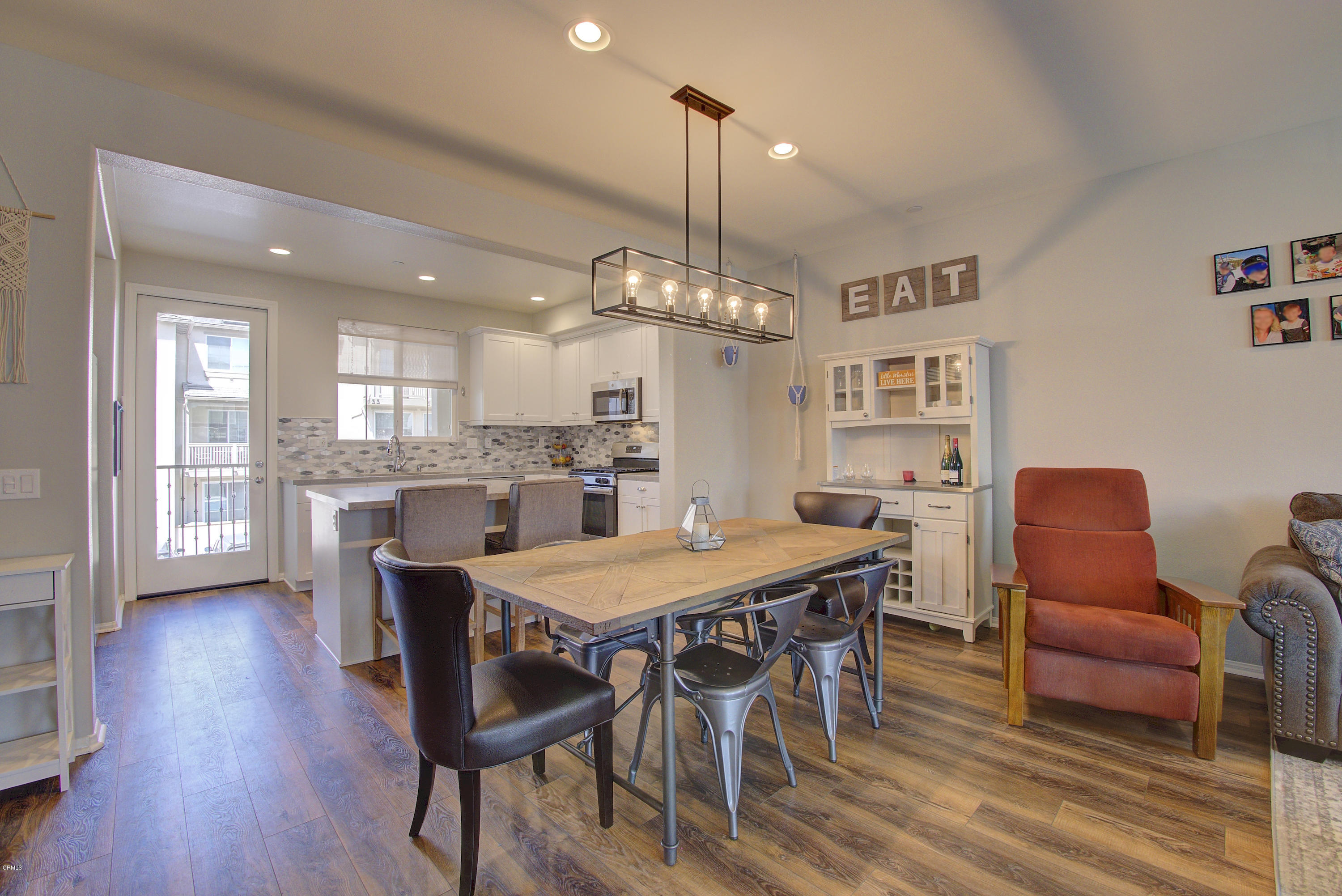 178 Prairie Street Camarillo, CA 93010 - Photo 10 of 74 a dining room with furniture a chandelier and wooden floor