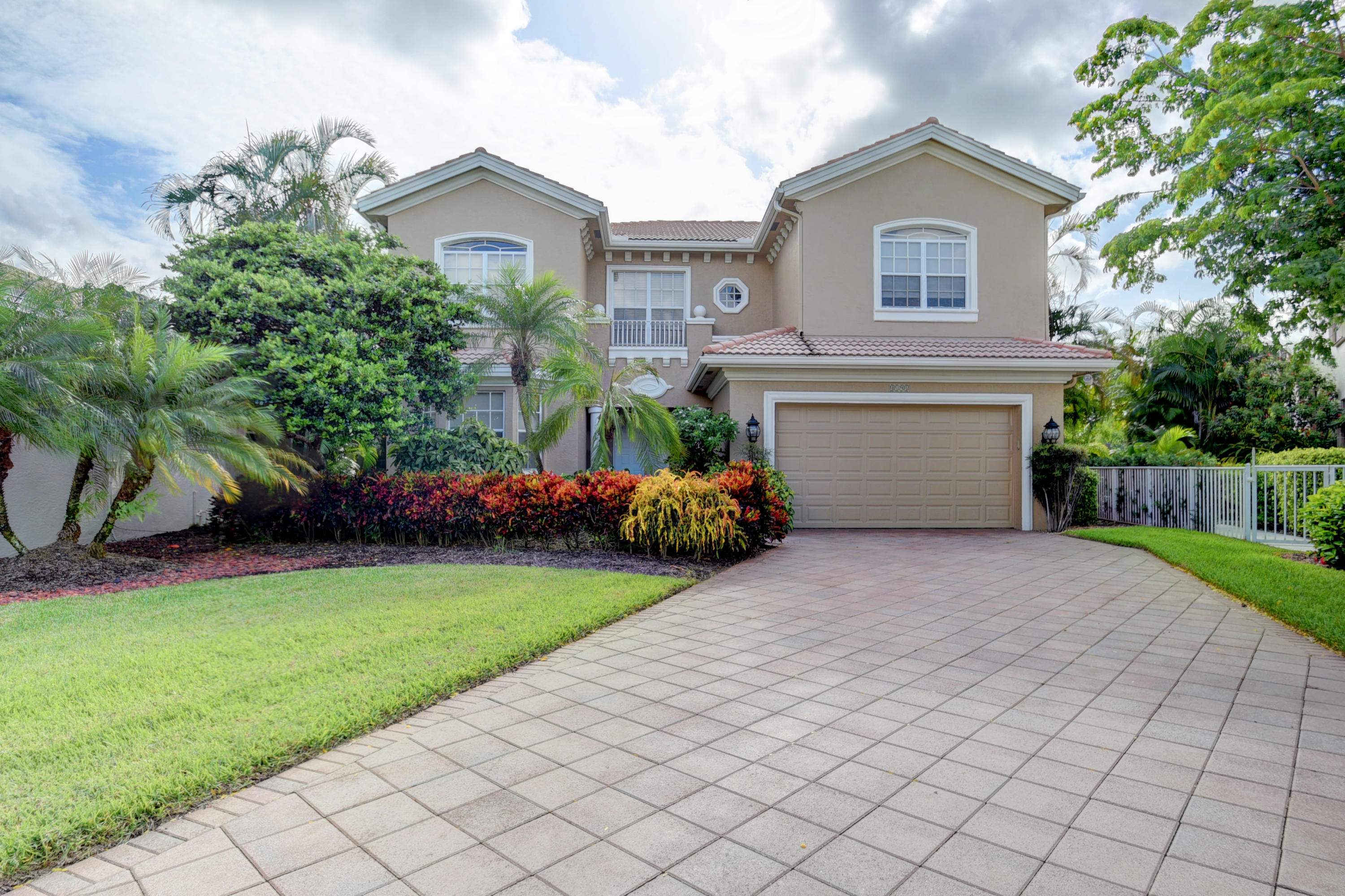 4191 Briarcliff Circle Boca Raton, FL 33496 - Photo 1 of 37 a front view of a house with garden