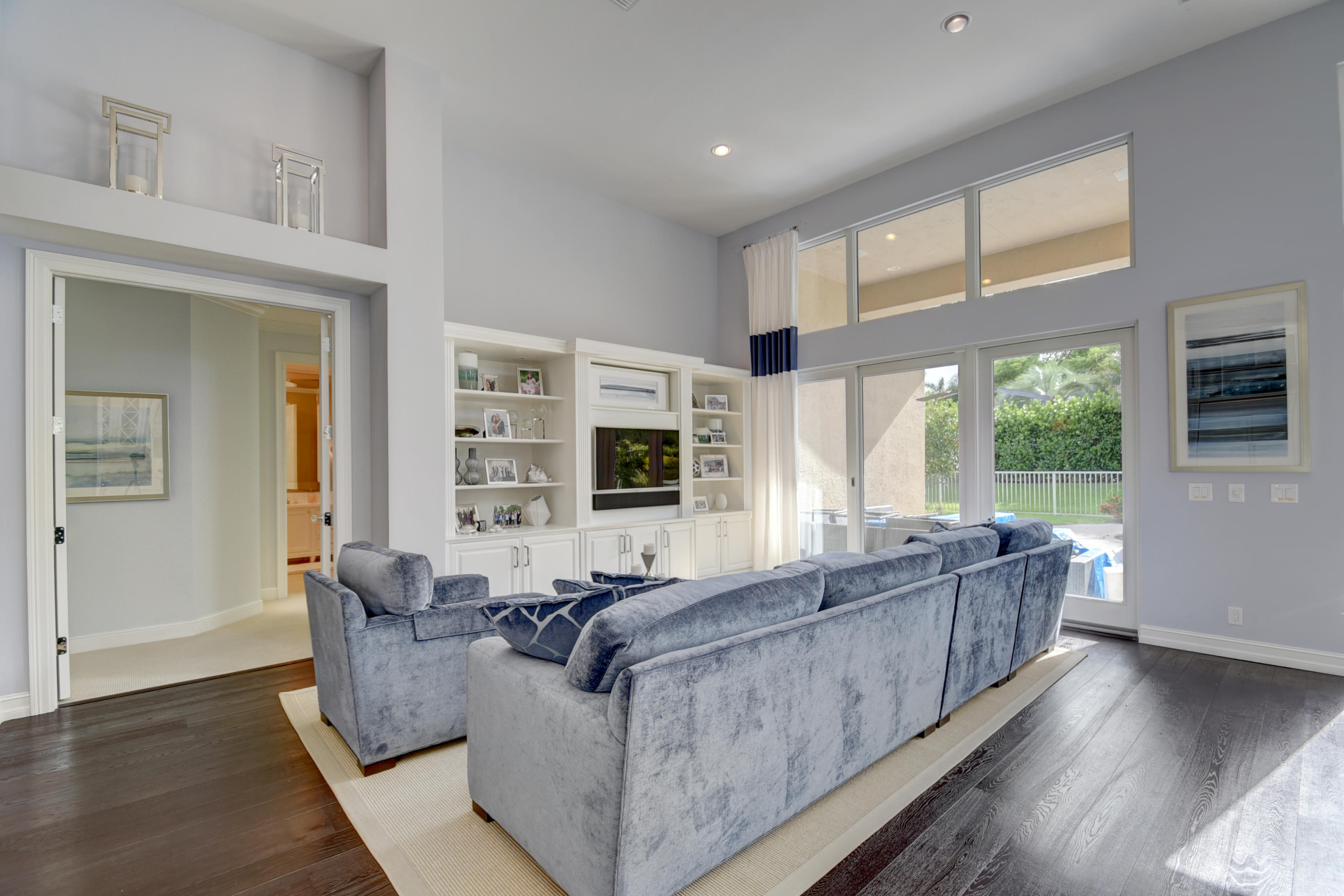 4191 Briarcliff Circle Boca Raton, FL 33496 - Photo 13 of 37 a living room with furniture and a large window