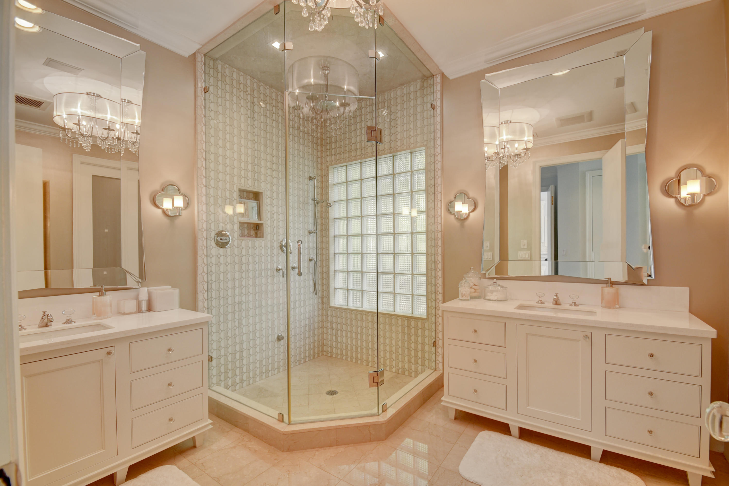 4191 Briarcliff Circle Boca Raton, FL 33496 - Photo 20 of 37 a spacious bathroom with a shower sink and mirror