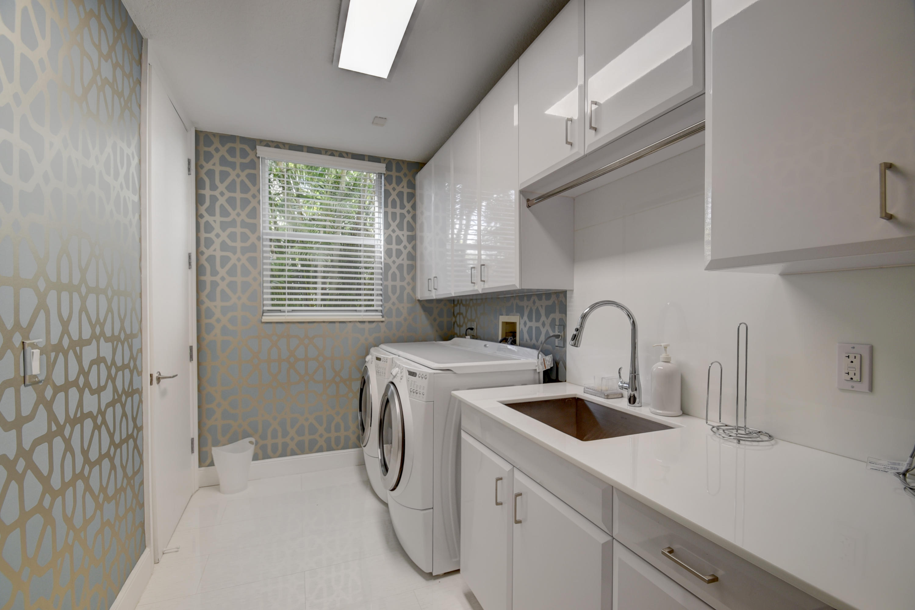 4191 Briarcliff Circle Boca Raton, FL 33496 - Photo 26 of 37 a utility room with sink dryer and washer