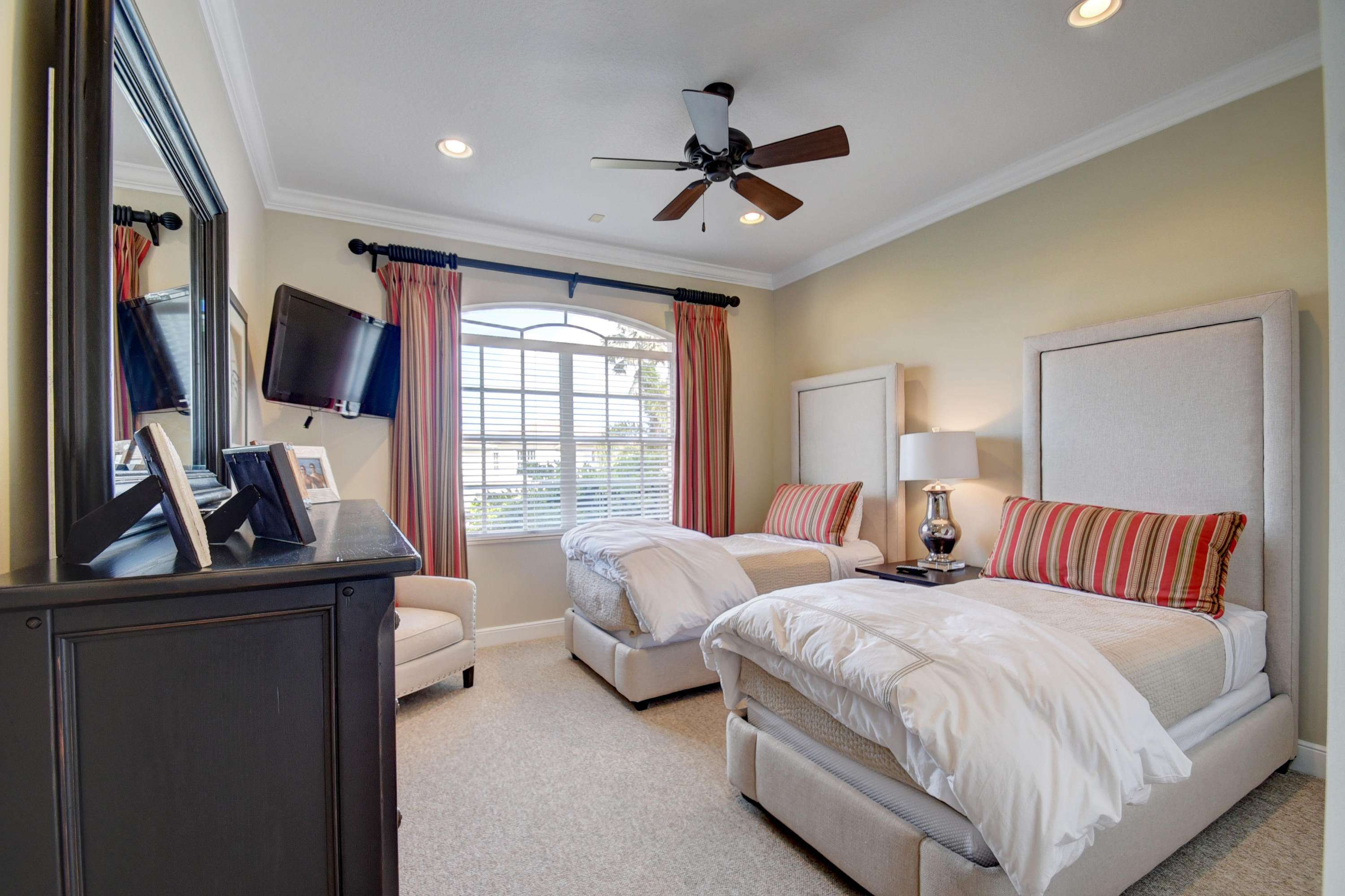 4191 Briarcliff Circle Boca Raton, FL 33496 - Photo 29 of 37 a bedroom with two beds and a flat screen tv