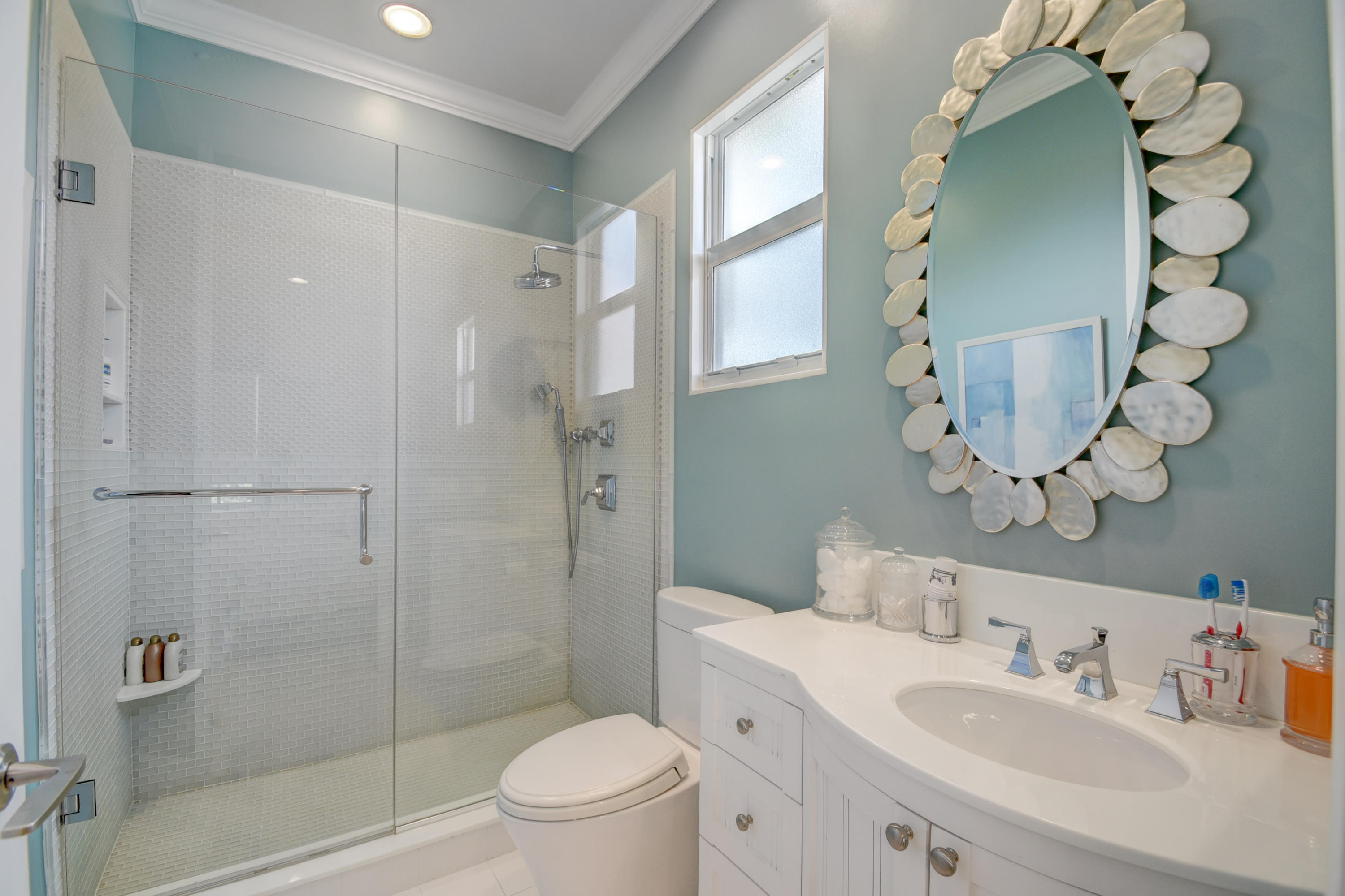 4191 Briarcliff Circle Boca Raton, FL 33496 - Photo 32 of 37 a bathroom with a sink toilet and shower