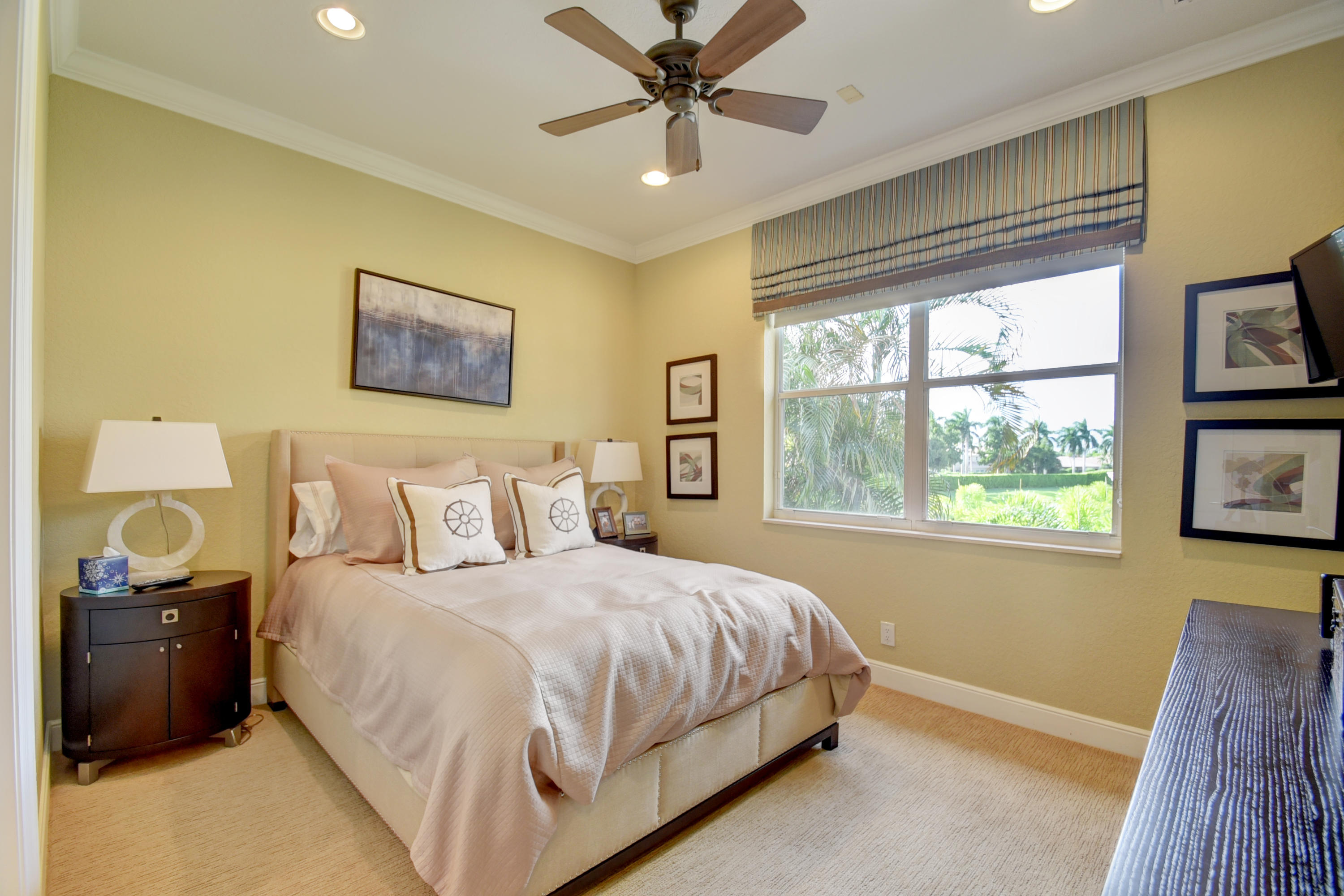 4191 Briarcliff Circle Boca Raton, FL 33496 - Photo 33 of 37 a bedroom with a bed and a painting on the wall