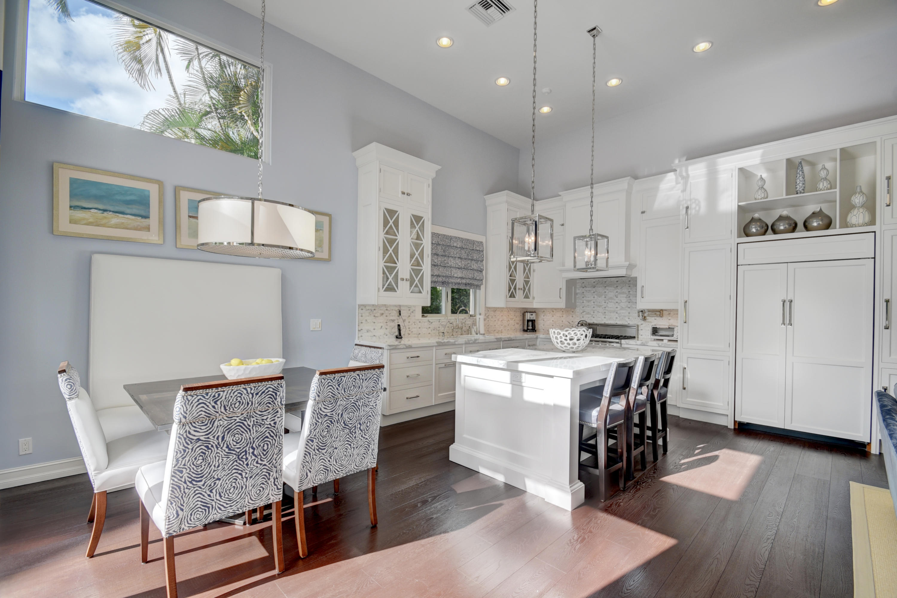 4191 Briarcliff Circle Boca Raton, FL 33496 - Photo 6 of 37 a kitchen with stainless steel appliances granite countertop a white cabinets and wooden floor