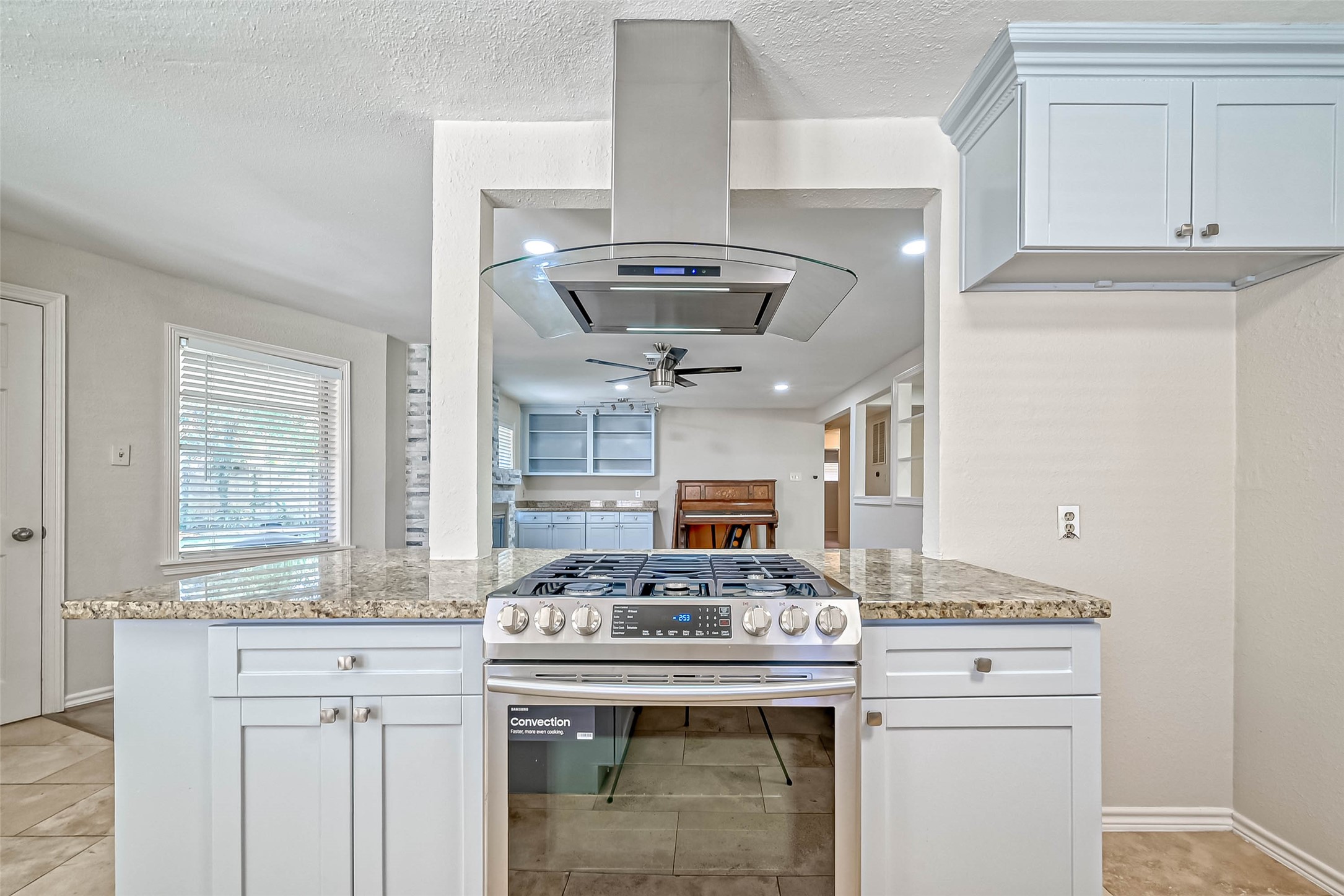 9707 Kit Street Houston, TX 77096 - Photo 16 of 45 a kitchen with a stove and a sink