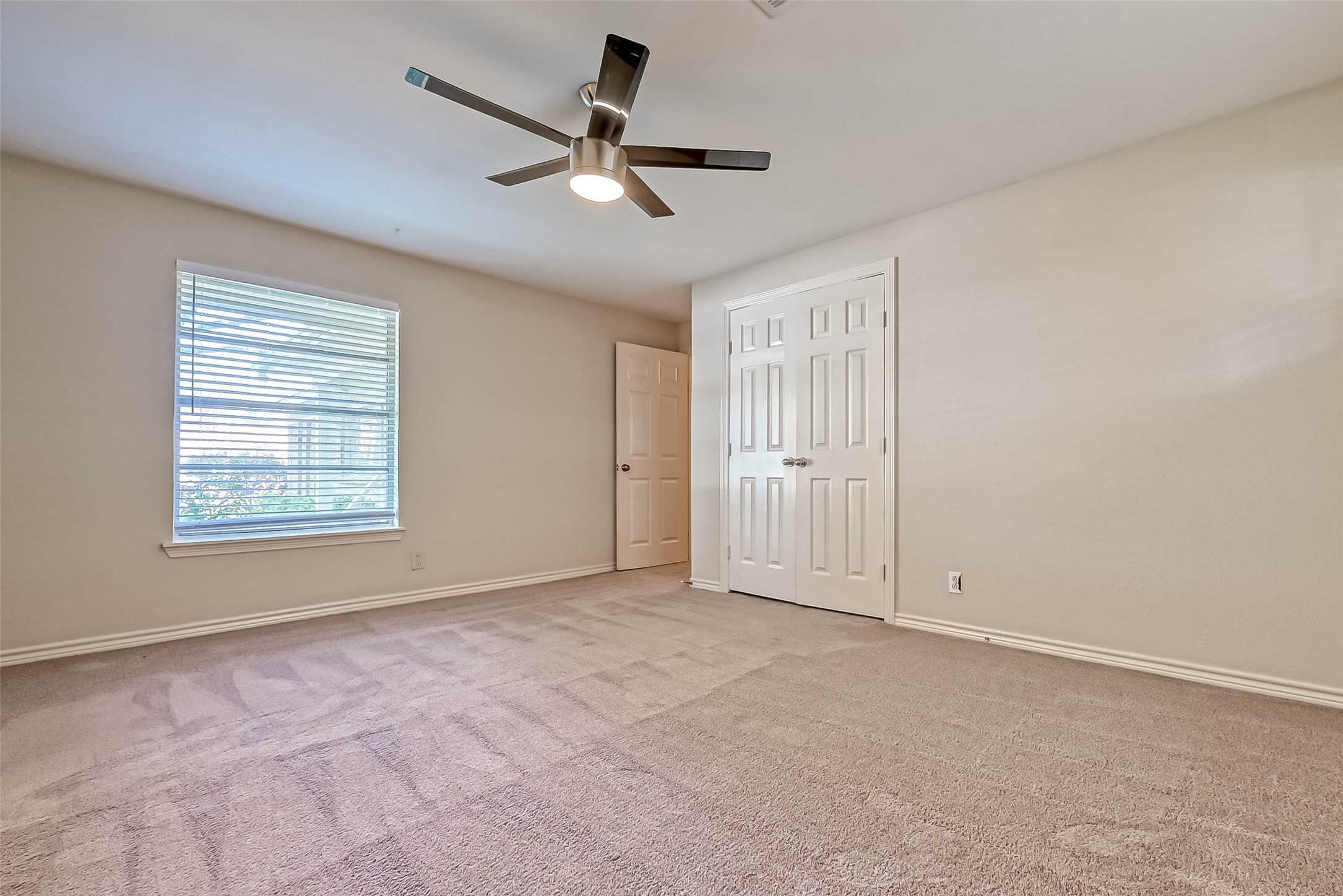 9707 Kit Street Houston, TX 77096 - Photo 32 of 45 a view of an empty room with a window