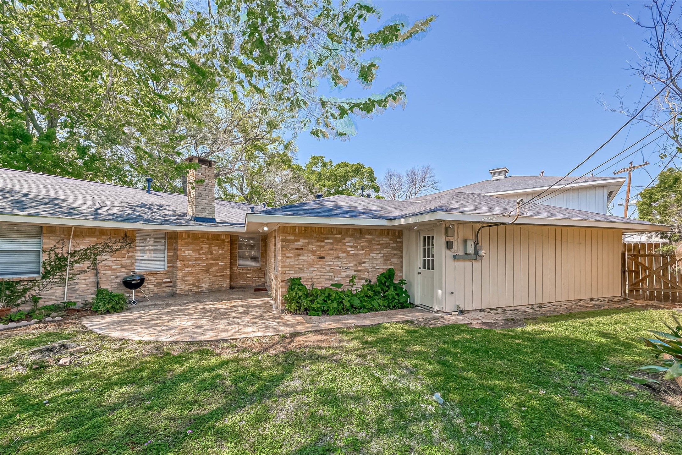 9707 Kit Street Houston, TX 77096 - Photo 42 of 45 front view of a house with a yard