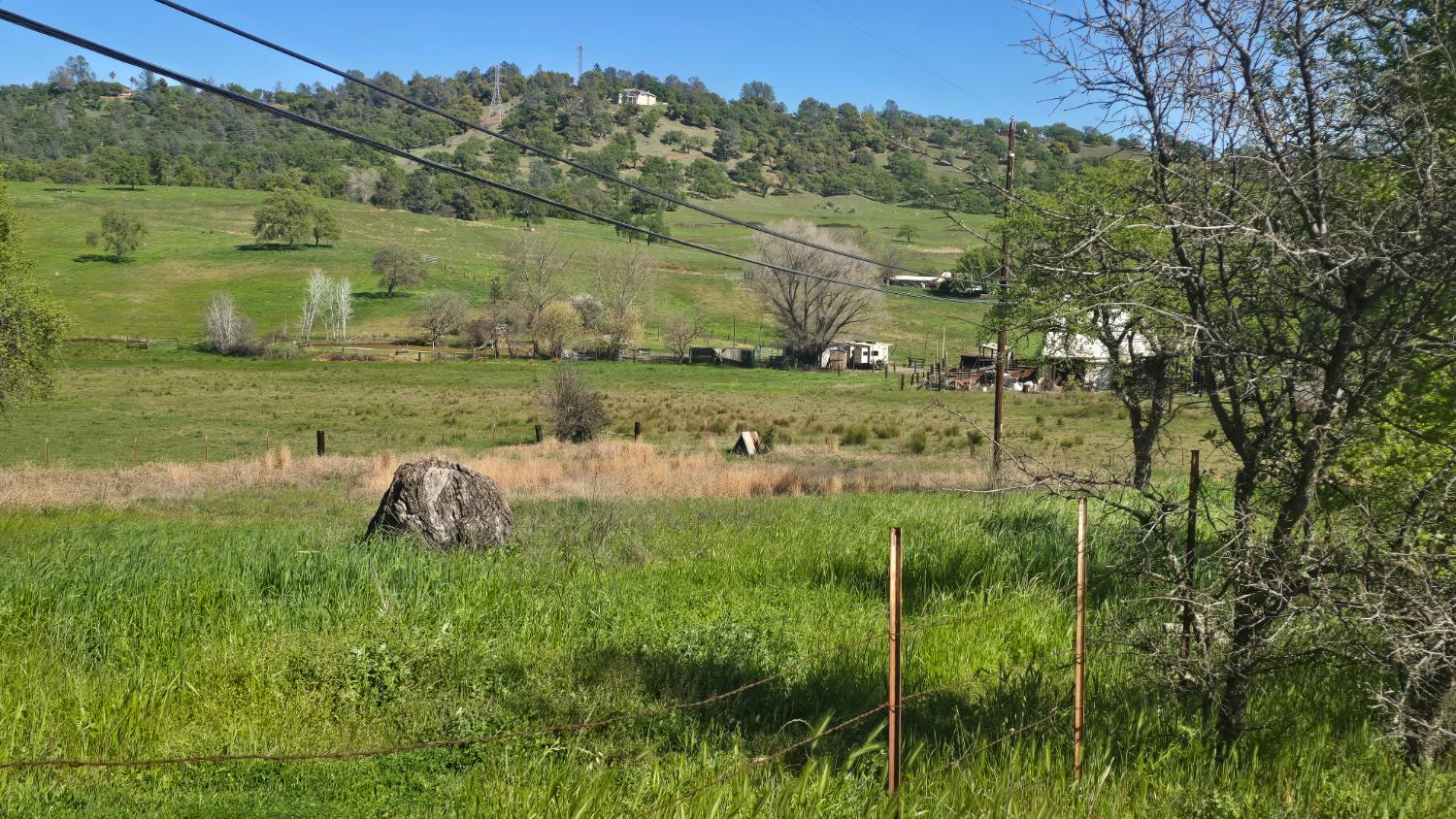11592 Peoria Road Browns Valley, CA 95918 - Photo 13 of 49 a view of a lake with a yard