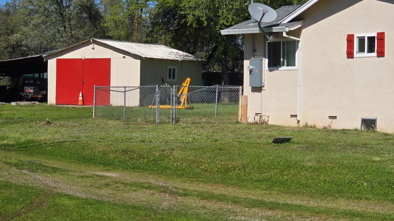 11592 Peoria Road Browns Valley, CA 95918 - Photo 21 of 49 a view of a house with a yard