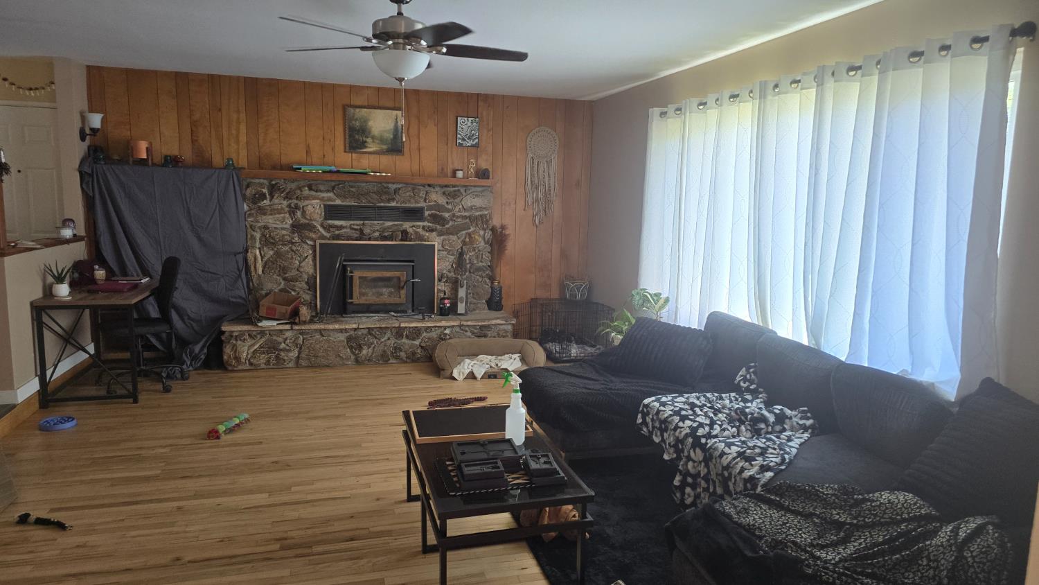 11592 Peoria Road Browns Valley, CA 95918 - Photo 33 of 49 a living room with furniture and a fireplace