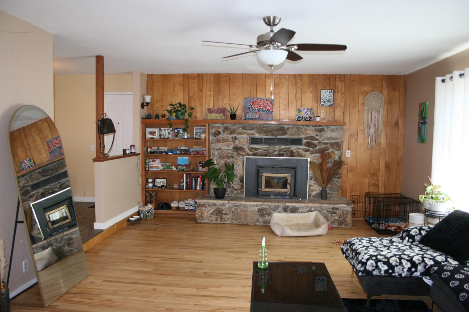 11592 Peoria Road Browns Valley, CA 95918 - Photo 41 of 49 a living room with furniture a flat screen tv and a fireplace
