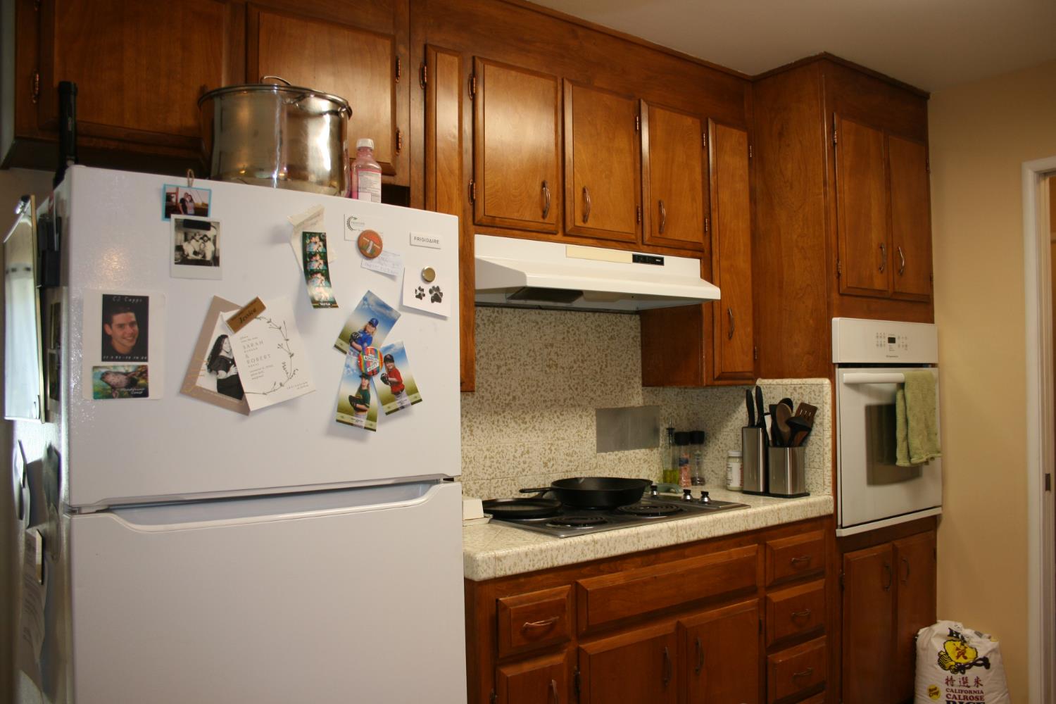 11592 Peoria Road Browns Valley, CA 95918 - Photo 42 of 49 a white refrigerator freezer sitting inside of a kitchen