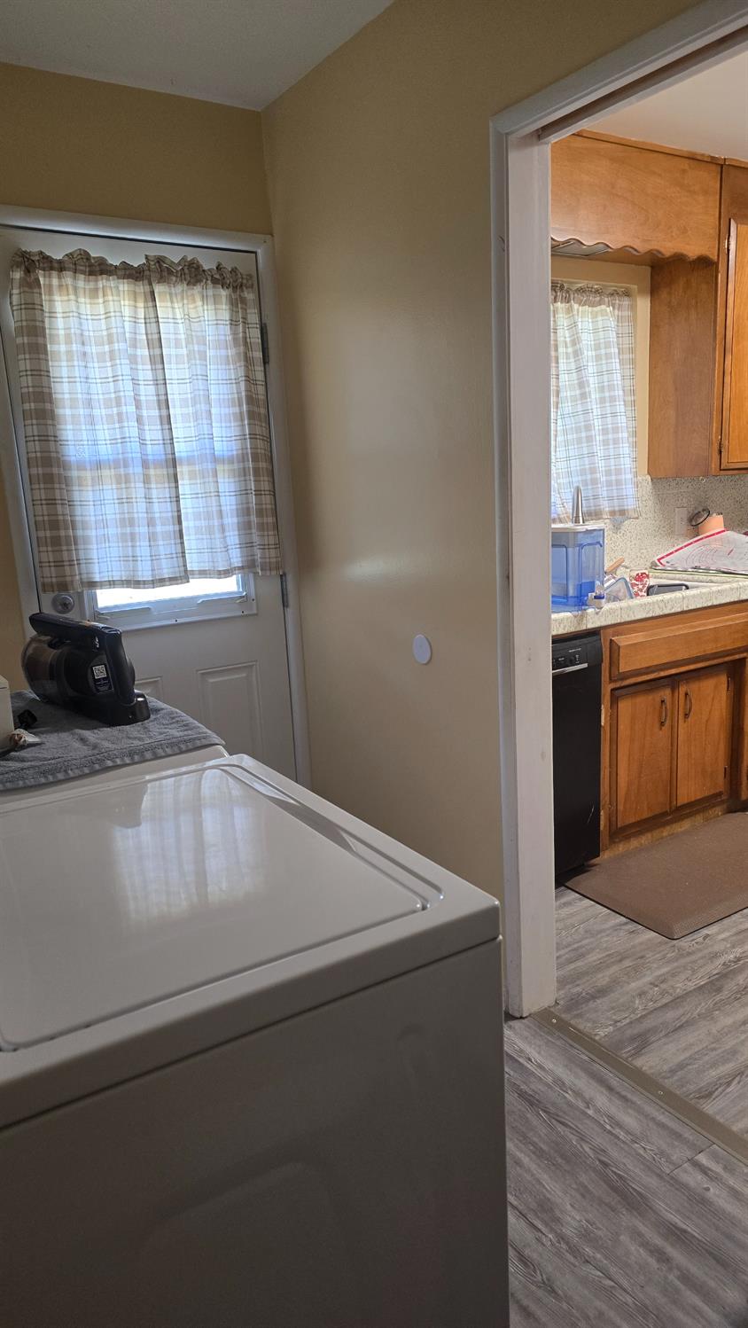 11592 Peoria Road Browns Valley, CA 95918 - Photo 10 of 49 a living room with stainless steel appliances furniture cabinets and a window