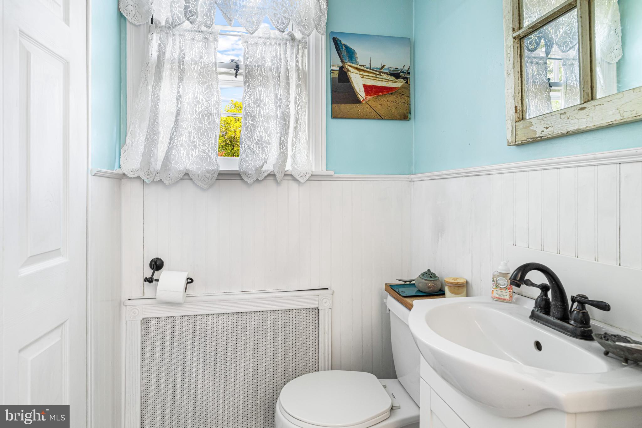 715 North Easton Road Glenside, PA 19038 - Photo 11 of 59 a bathroom with a sink mirror and toilet