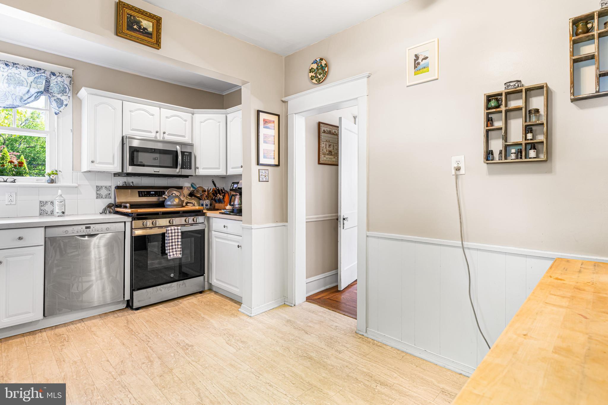715 North Easton Road Glenside, PA 19038 - Photo 14 of 59 a kitchen with stainless steel appliances granite countertop a refrigerator and a stove top oven