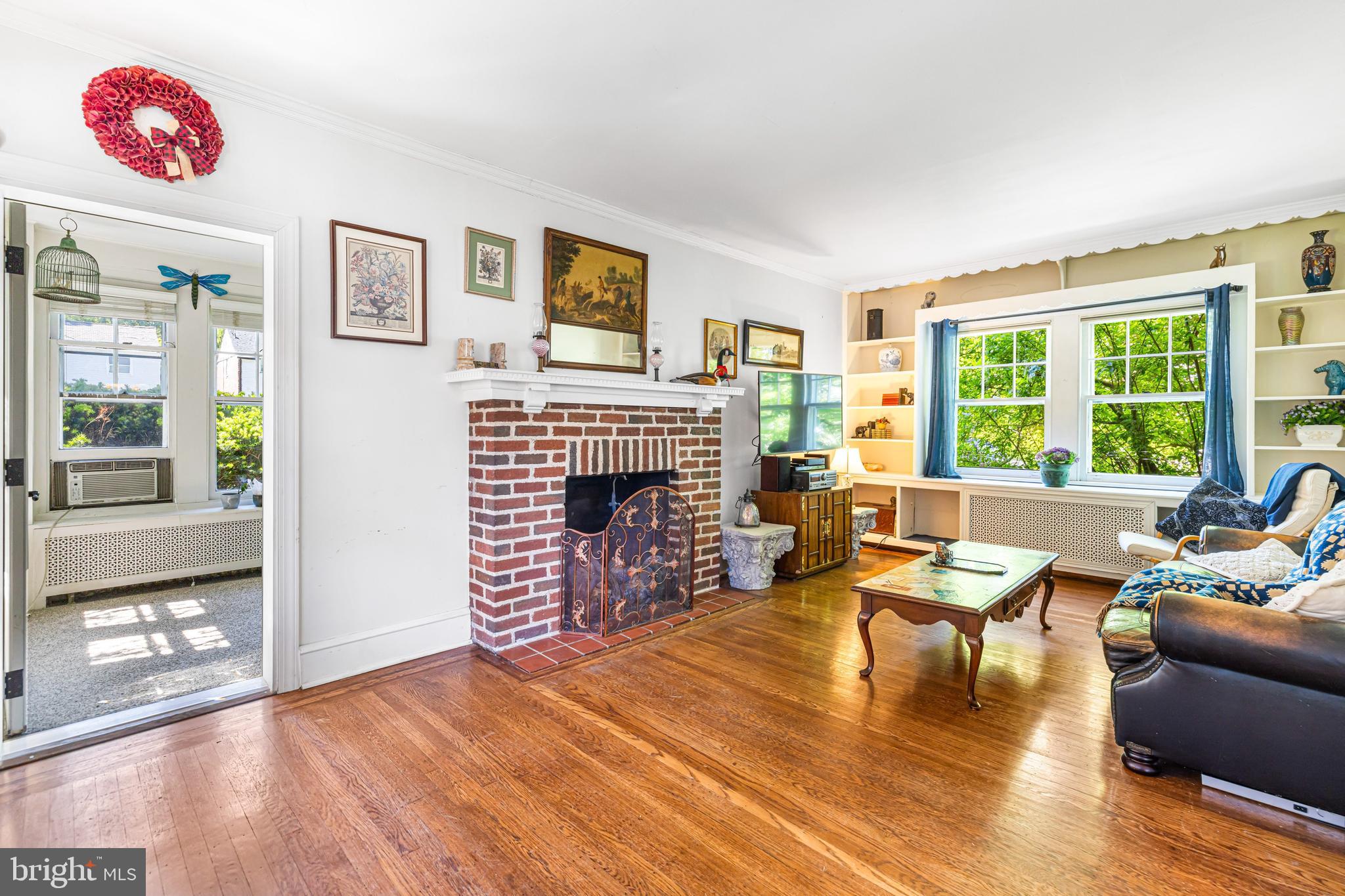 715 North Easton Road Glenside, PA 19038 - Photo 15 of 59 a living room with furniture large window and a fireplace