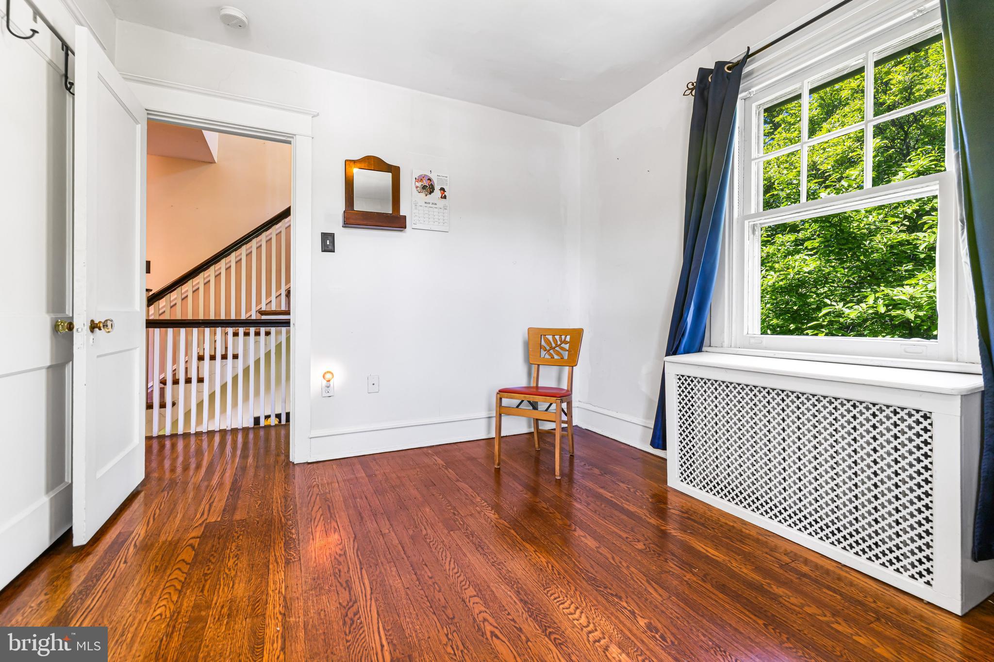 715 North Easton Road Glenside, PA 19038 - Photo 24 of 59 a view of a hallway with wooden floor and furniture