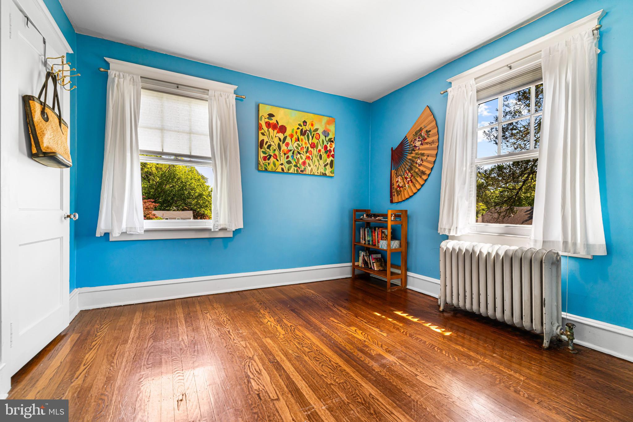 715 North Easton Road Glenside, PA 19038 - Photo 25 of 59 a view of an empty room with window and wooden floor