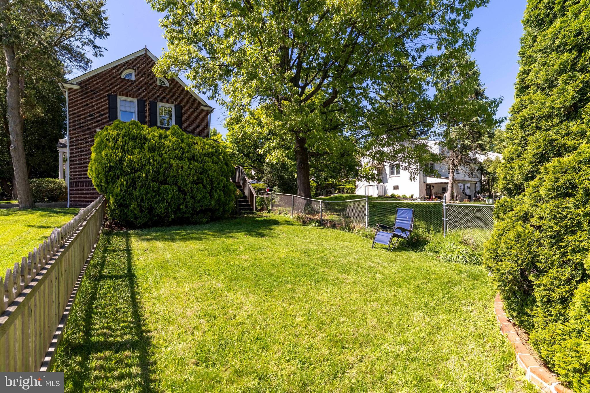 715 North Easton Road Glenside, PA 19038 - Photo 39 of 59 a backyard of a house with swimming pool and large trees