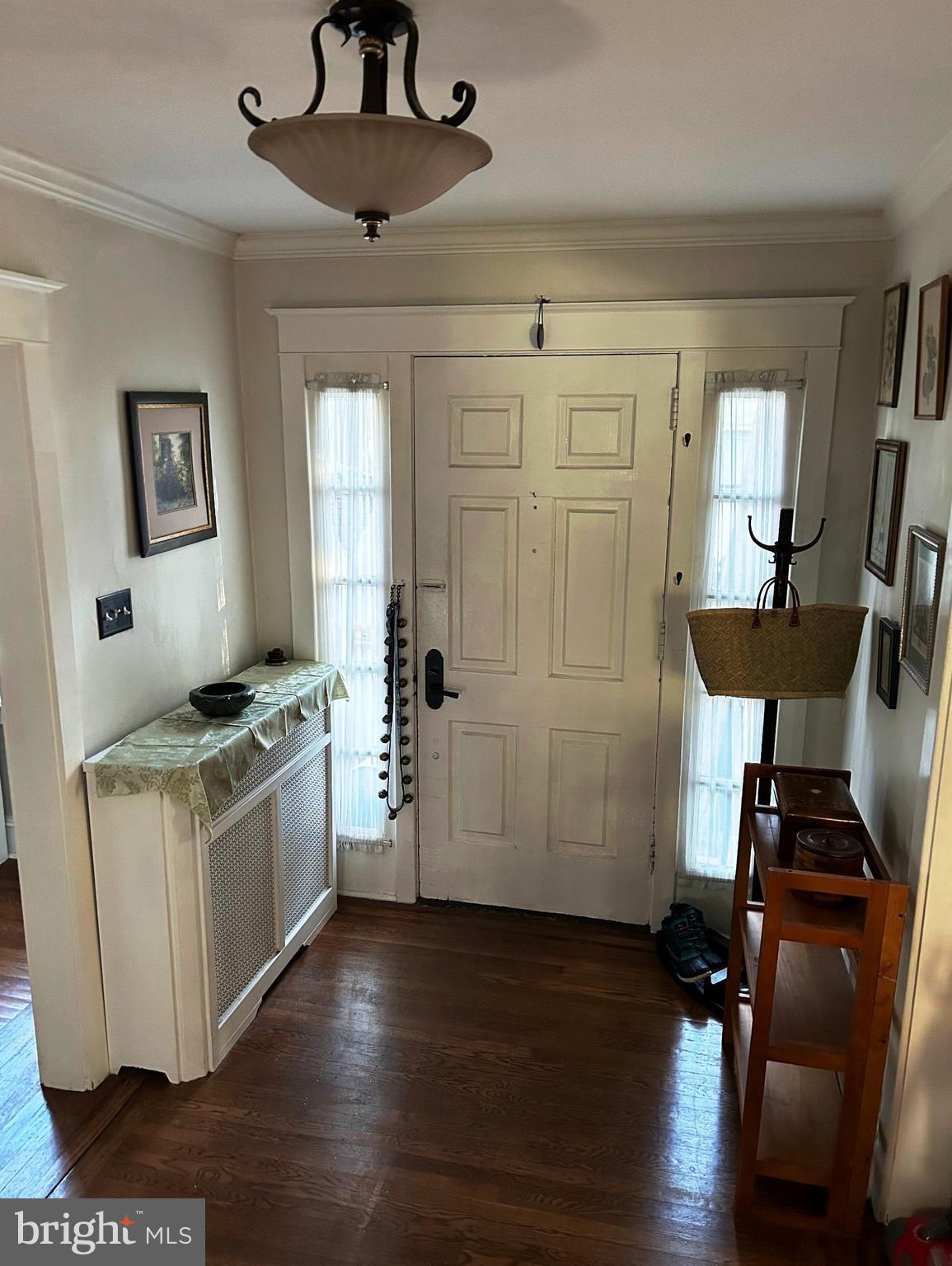 715 North Easton Road Glenside, PA 19038 - Photo 54 of 59 a kitchen with a table chairs refrigerator and wooden floor