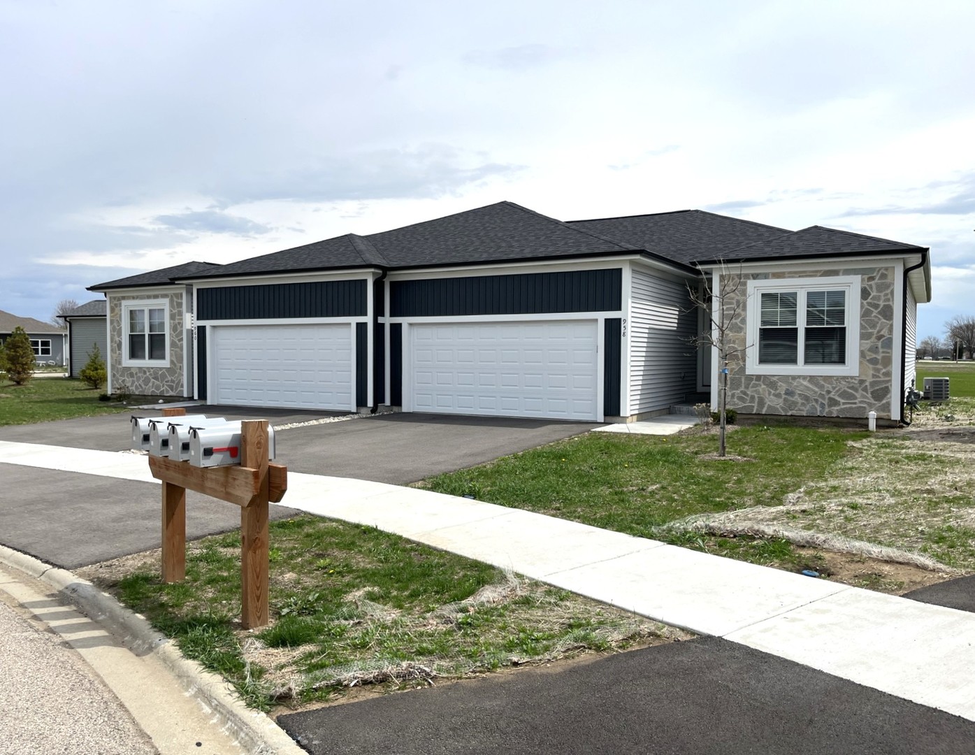 958 Partridge Circle Marengo, IL 60152 - Photo 1 of 17 a front view of a house with garden