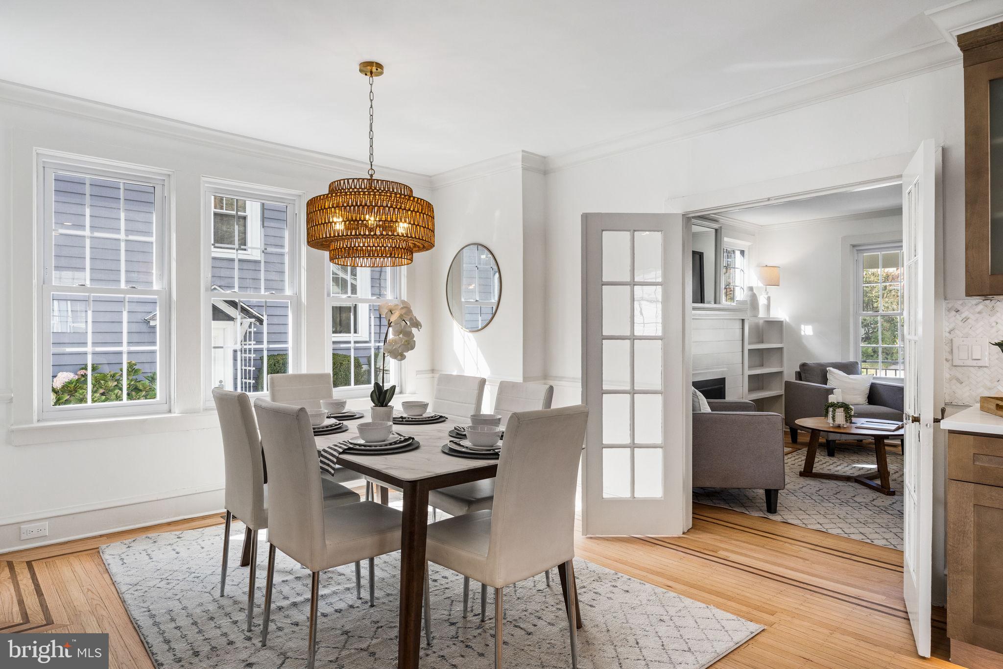 13 Princeton Road Havertown, PA 19083 - Photo 20 of 73 a dining room with furniture a chandelier and wooden floor