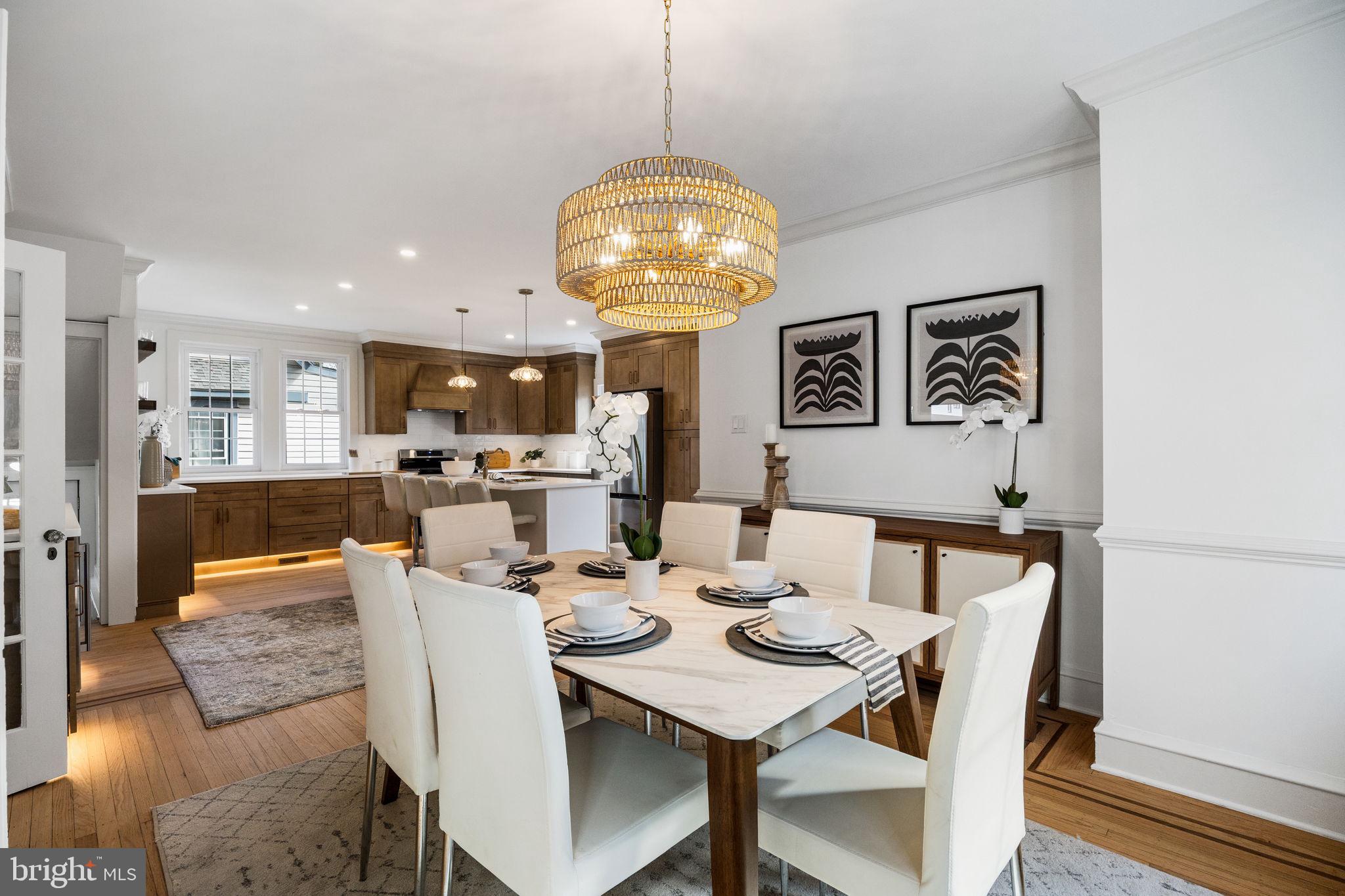 13 Princeton Road Havertown, PA 19083 - Photo 24 of 73 a dining room with furniture a chandelier and wooden floor