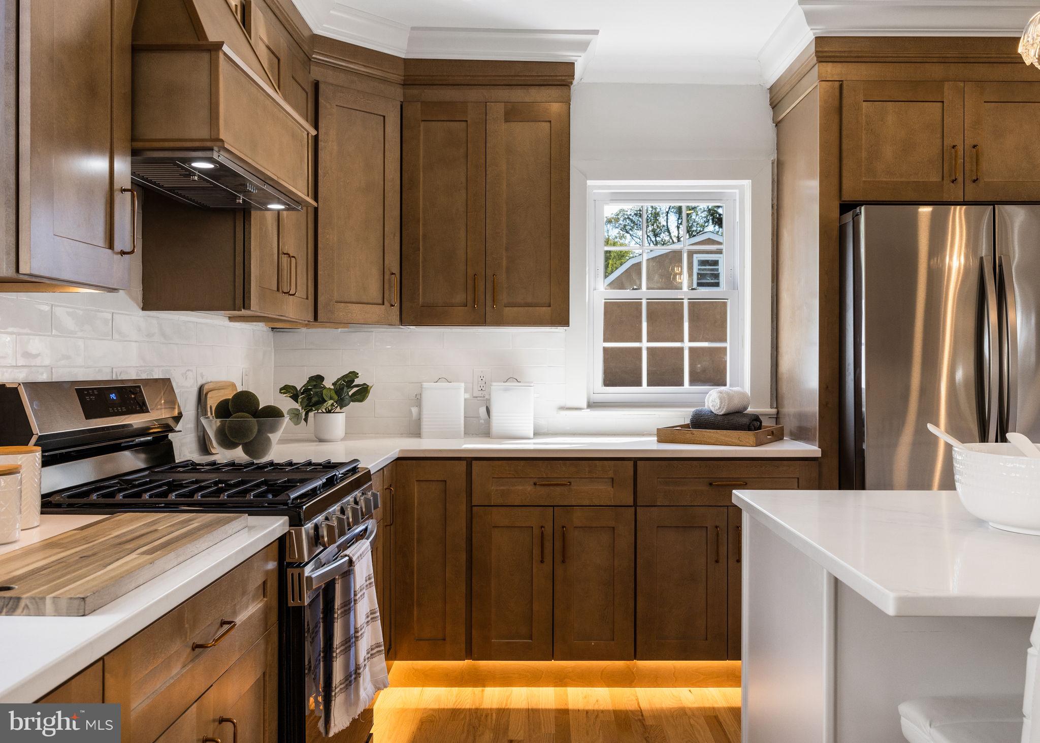 13 Princeton Road Havertown, PA 19083 - Photo 33 of 73 a kitchen that has a sink and a stove