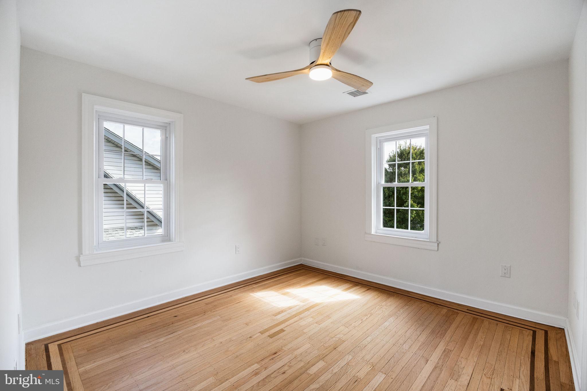 13 Princeton Road Havertown, PA 19083 - Photo 40 of 73 a view of an empty room with wooden floor and a window