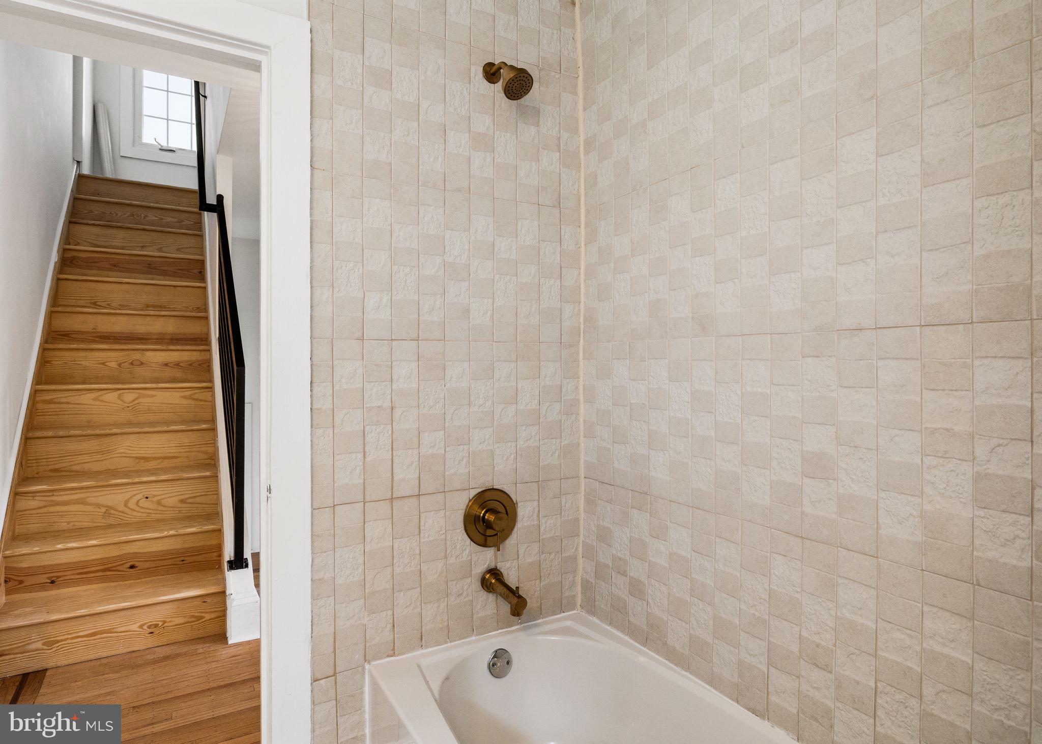 13 Princeton Road Havertown, PA 19083 - Photo 43 of 73 a bathroom with a bathtub