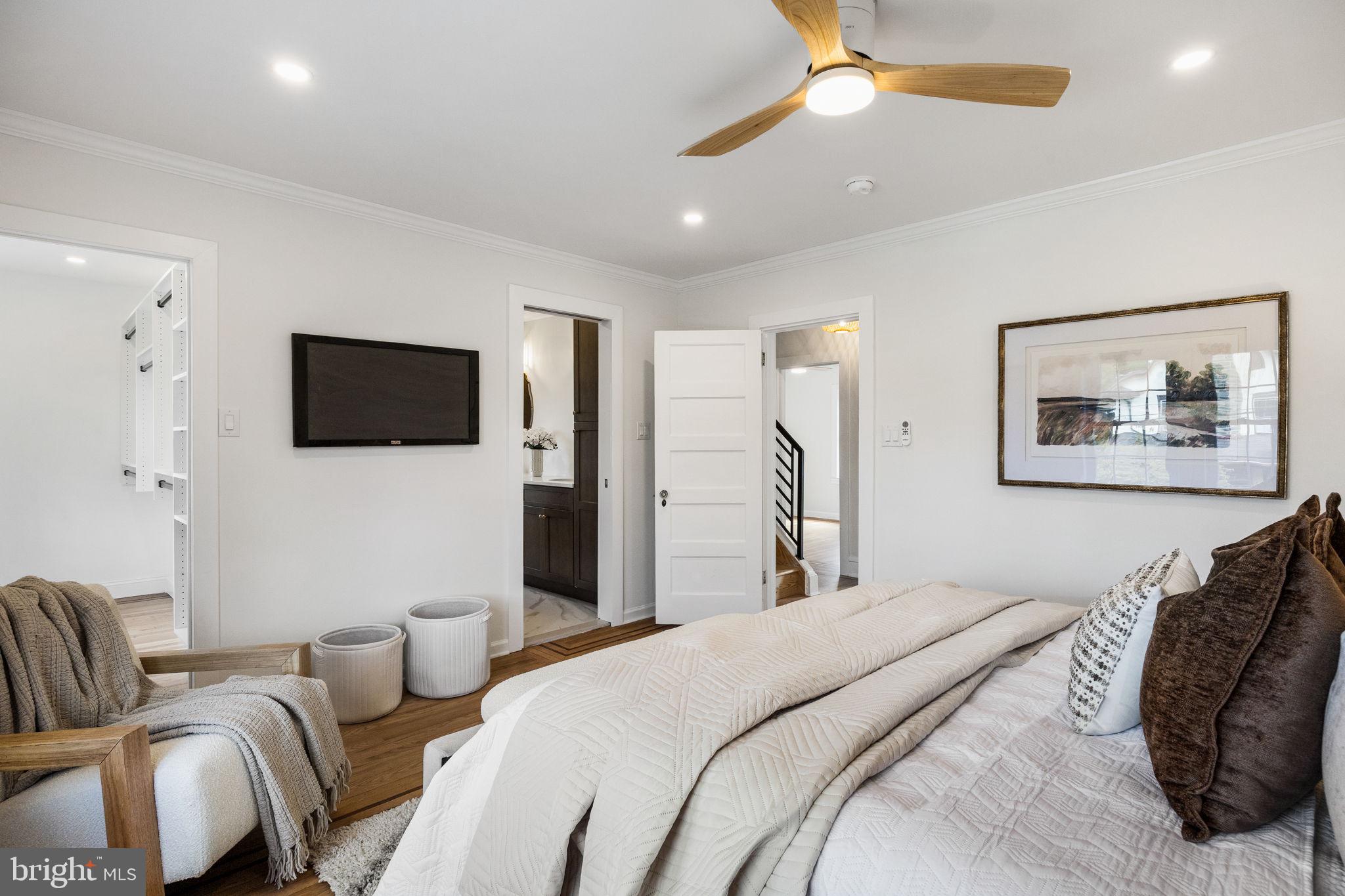 13 Princeton Road Havertown, PA 19083 - Photo 47 of 73 a bedroom with a bed couch and a flat screen tv