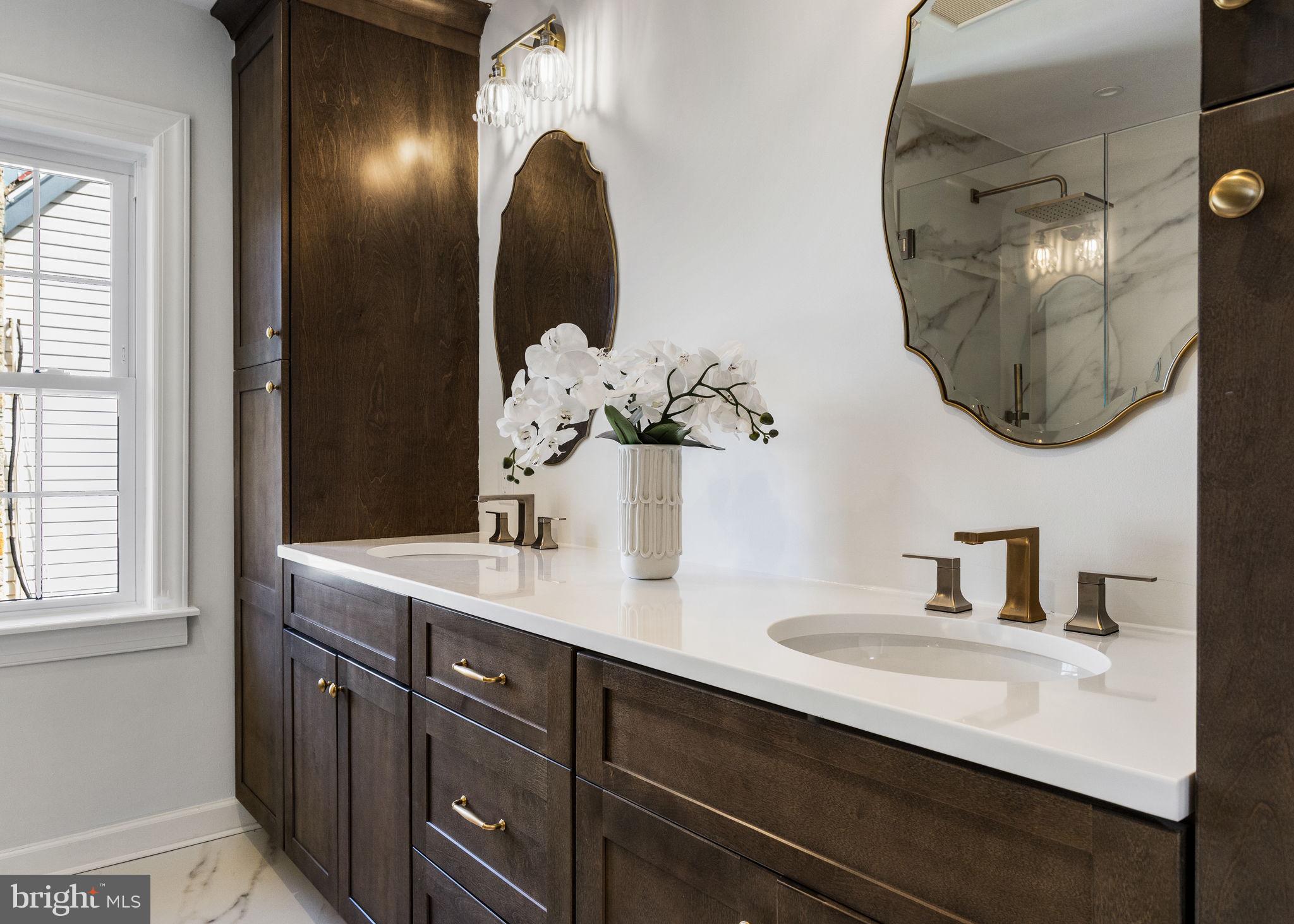 13 Princeton Road Havertown, PA 19083 - Photo 49 of 73 a bathroom with a sink and a mirror