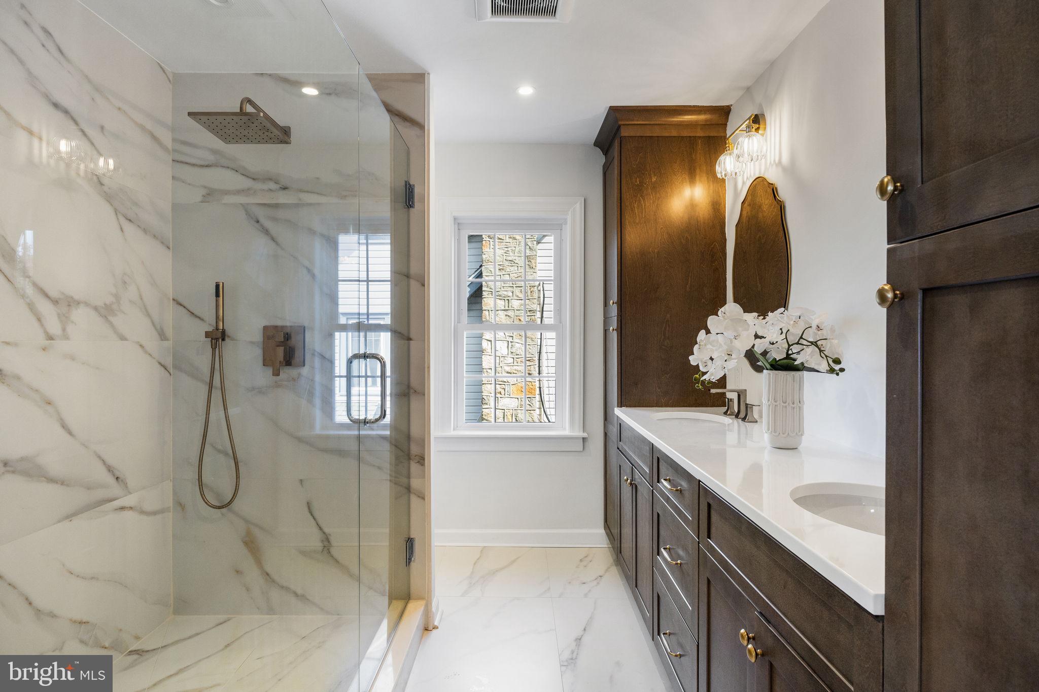 13 Princeton Road Havertown, PA 19083 - Photo 51 of 73 a spacious bathroom with a double vanity sink mirror and shower