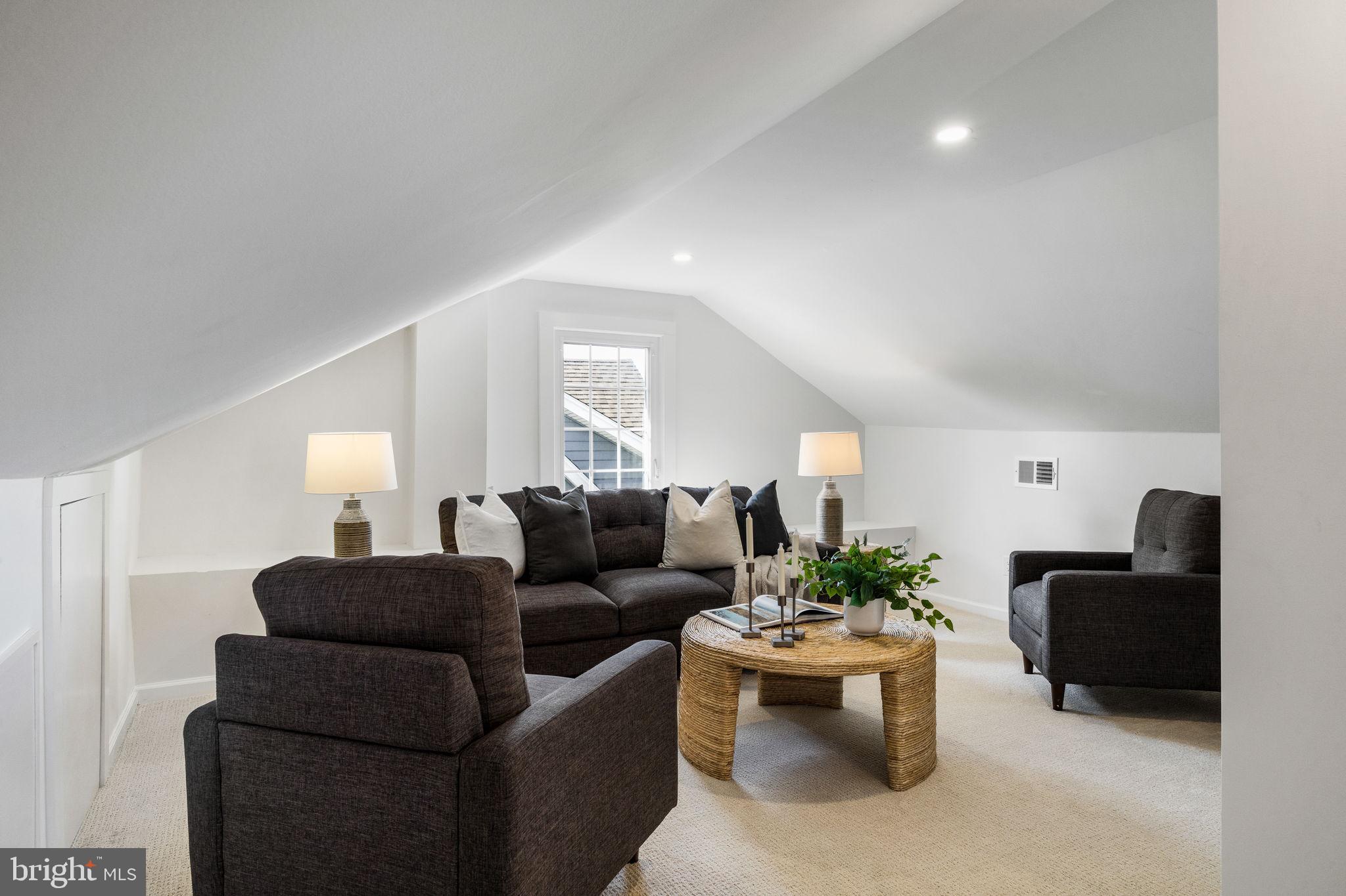 13 Princeton Road Havertown, PA 19083 - Photo 55 of 73 a living room with furniture and a potted plant