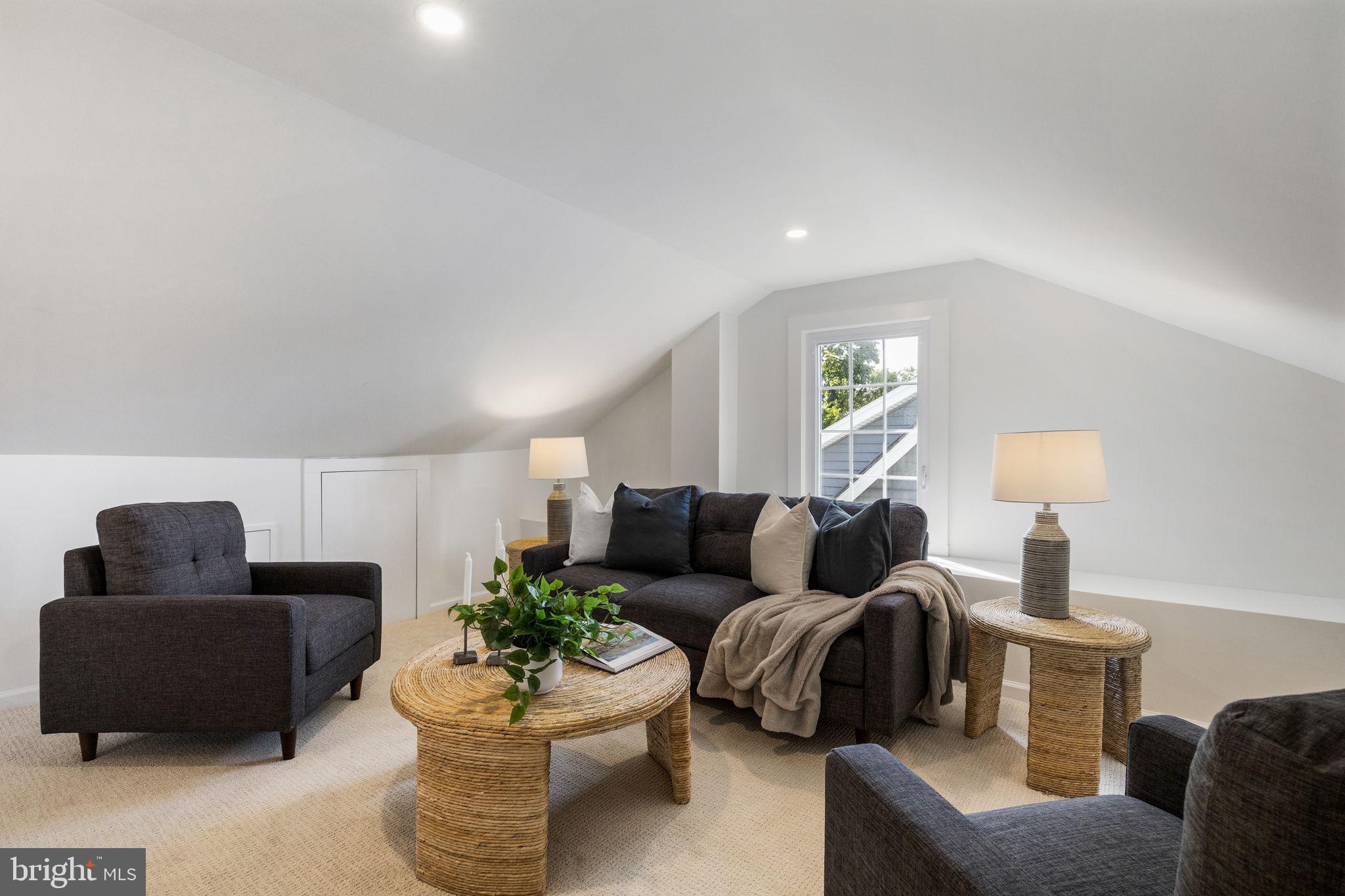 13 Princeton Road Havertown, PA 19083 - Photo 56 of 73 a living room with furniture and a lamp