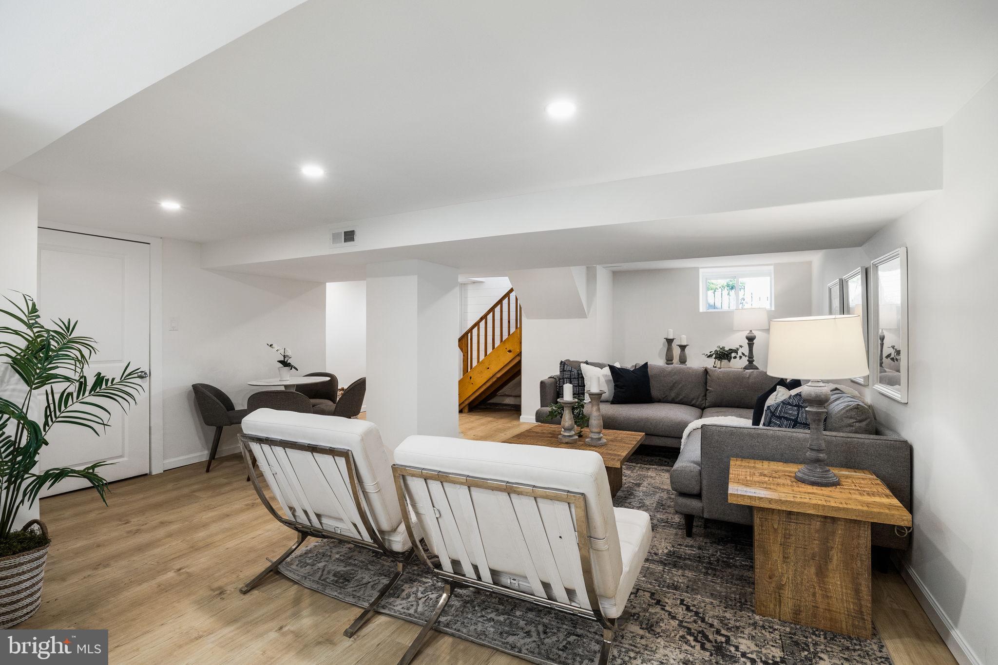 13 Princeton Road Havertown, PA 19083 - Photo 62 of 73 a living room with furniture and wooden floor