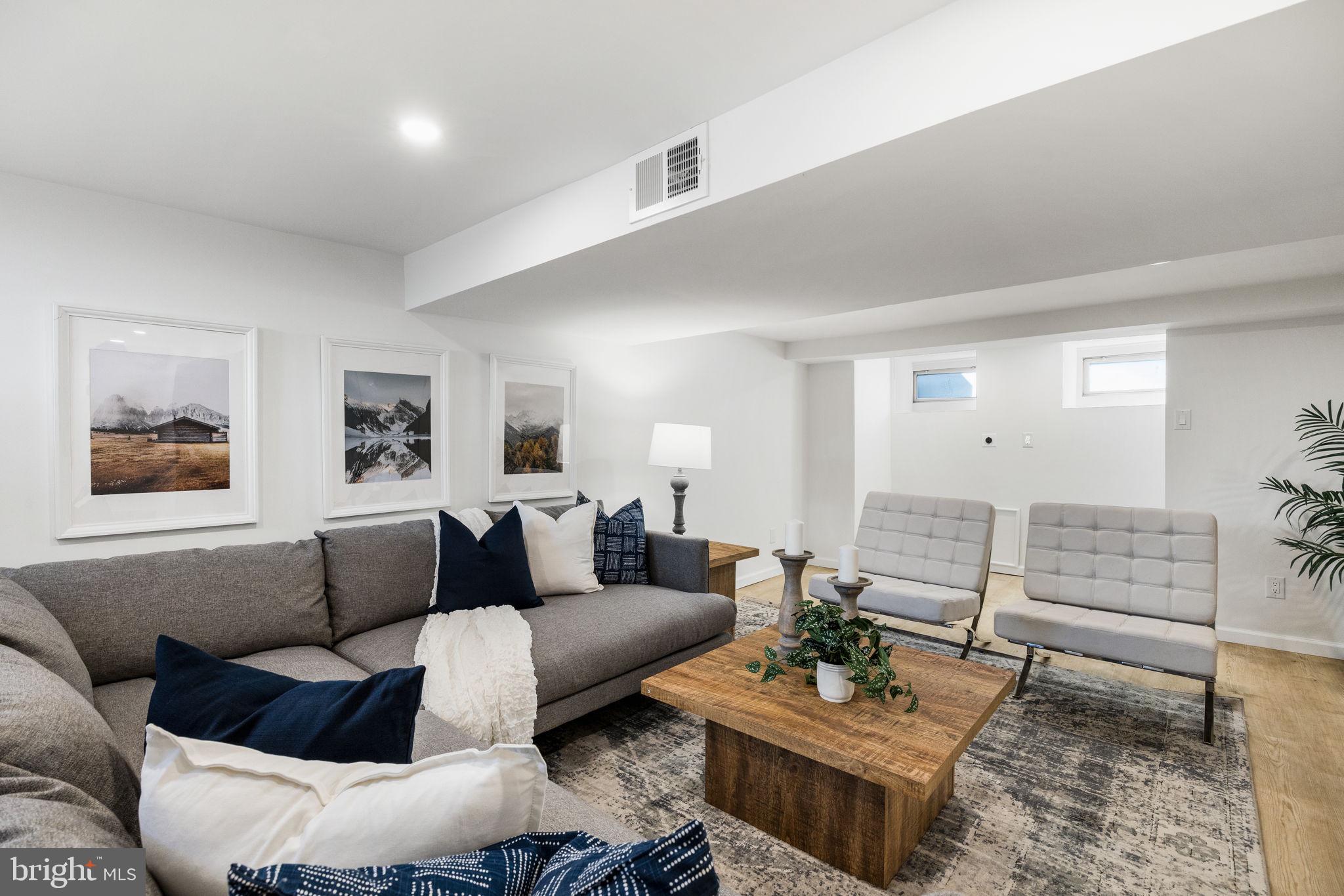 13 Princeton Road Havertown, PA 19083 - Photo 64 of 73 a living room with furniture and wooden floor