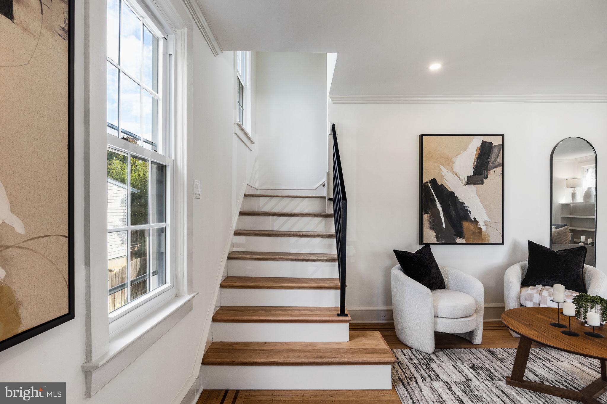 13 Princeton Road Havertown, PA 19083 - Photo 8 of 73 a living room with furniture and a painting on the wall