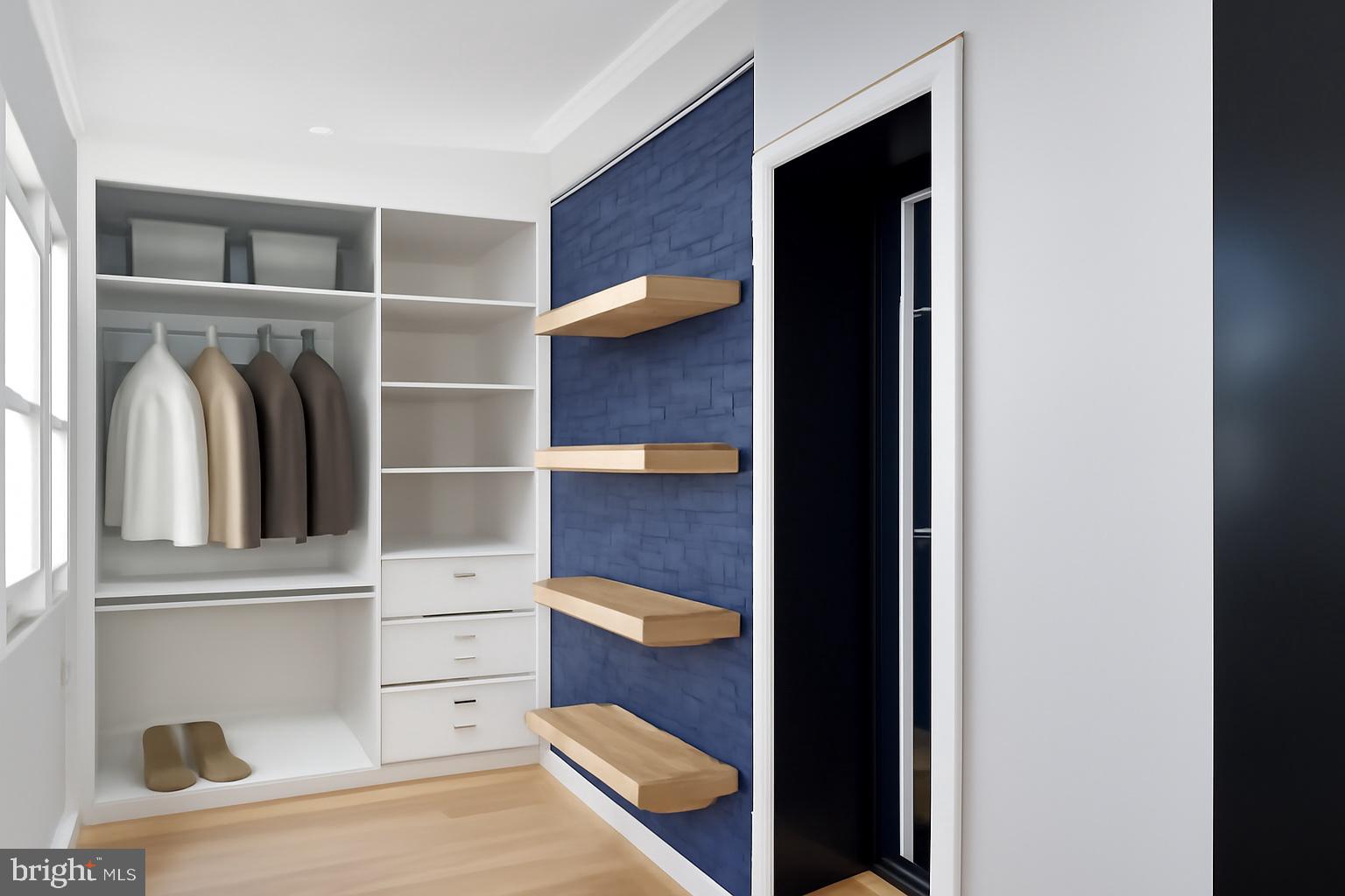 35 Michigan Avenue Northeast Washington, DC 20002 - Photo 12 of 28 a view of walk in closet with clothes and shoes