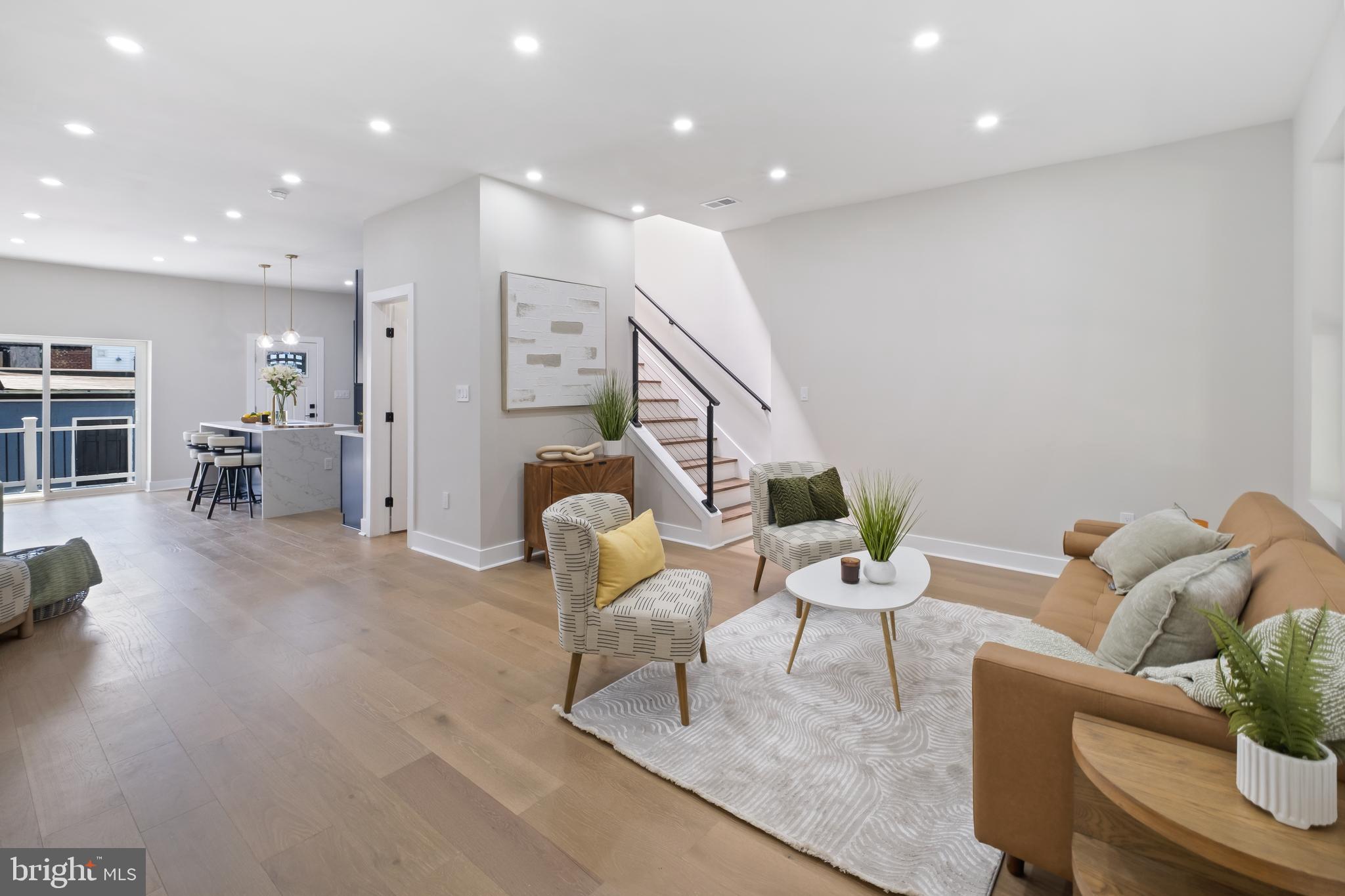 35 Michigan Avenue Northeast Washington, DC 20002 - Photo 2 of 28 a living room with furniture and a wooden floor