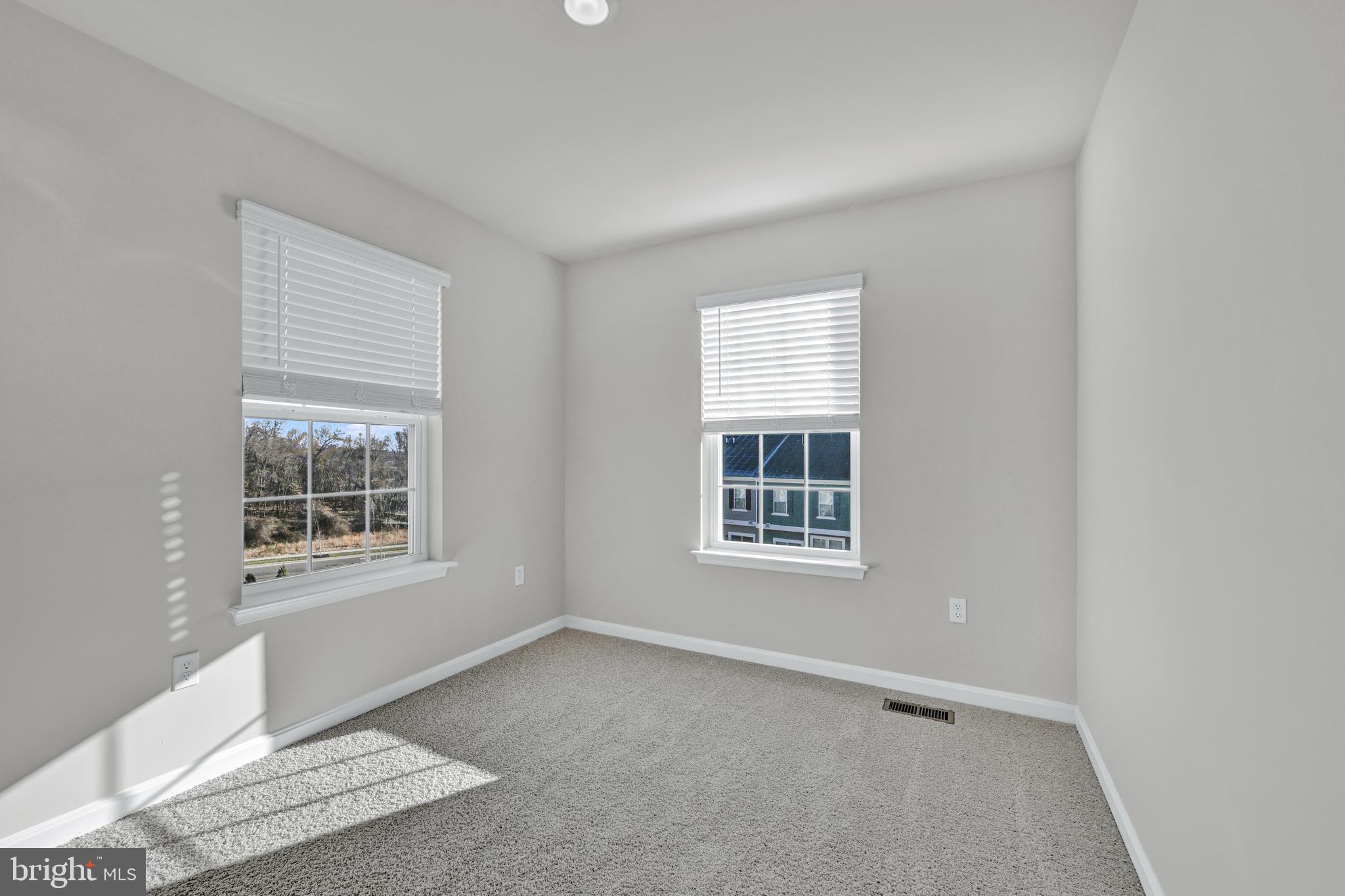 32 Merion Avenue Baltimore, MD 21237 - Photo 12 of 24 an empty room with a window