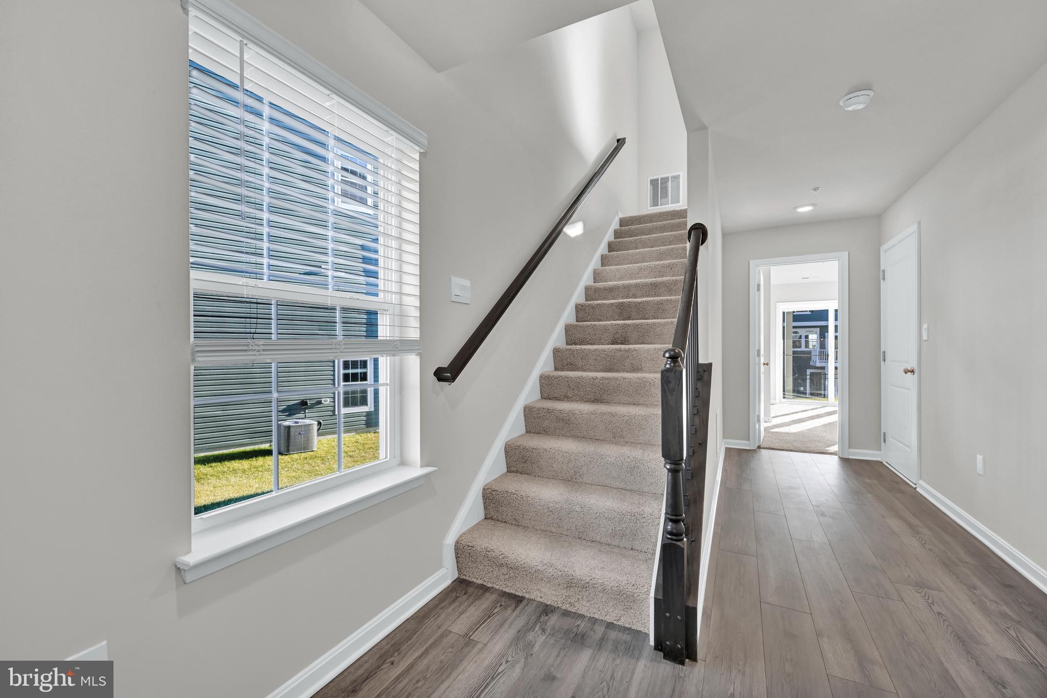 32 Merion Avenue Baltimore, MD 21237 - Photo 20 of 24 a view of entryway and hall with wooden floor