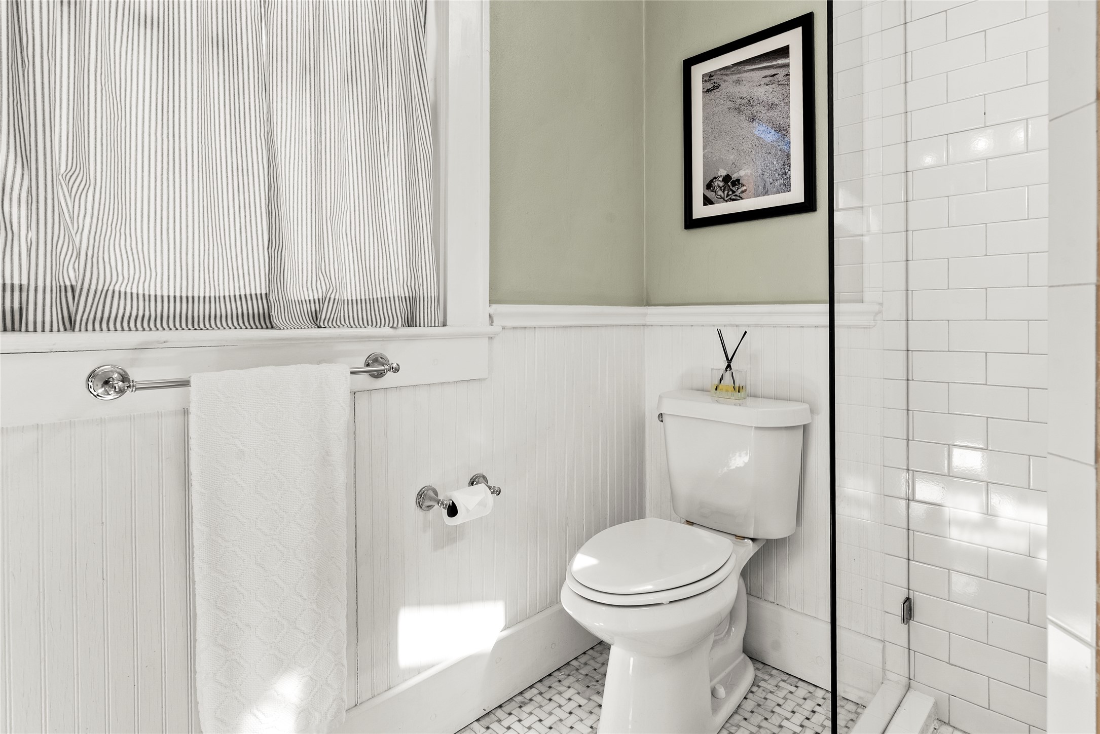1809 Nickerson Street Austin, TX 78704 - Photo 17 of 31 Bathroom featuring wainscoting and designer tiles with custom shower