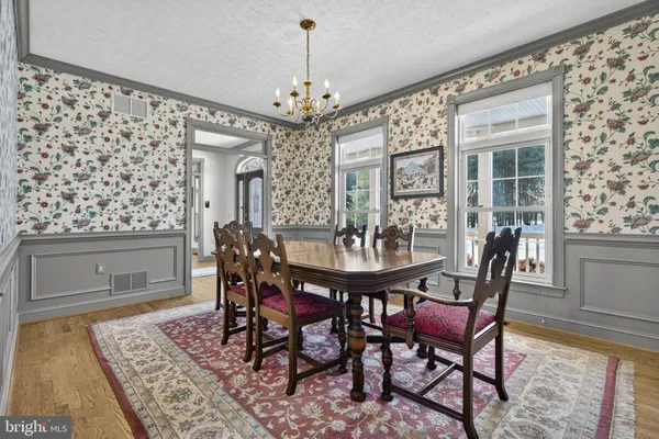 a view of a dining room with furniture