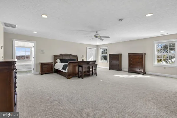 a view of a livingroom with gym equipment
