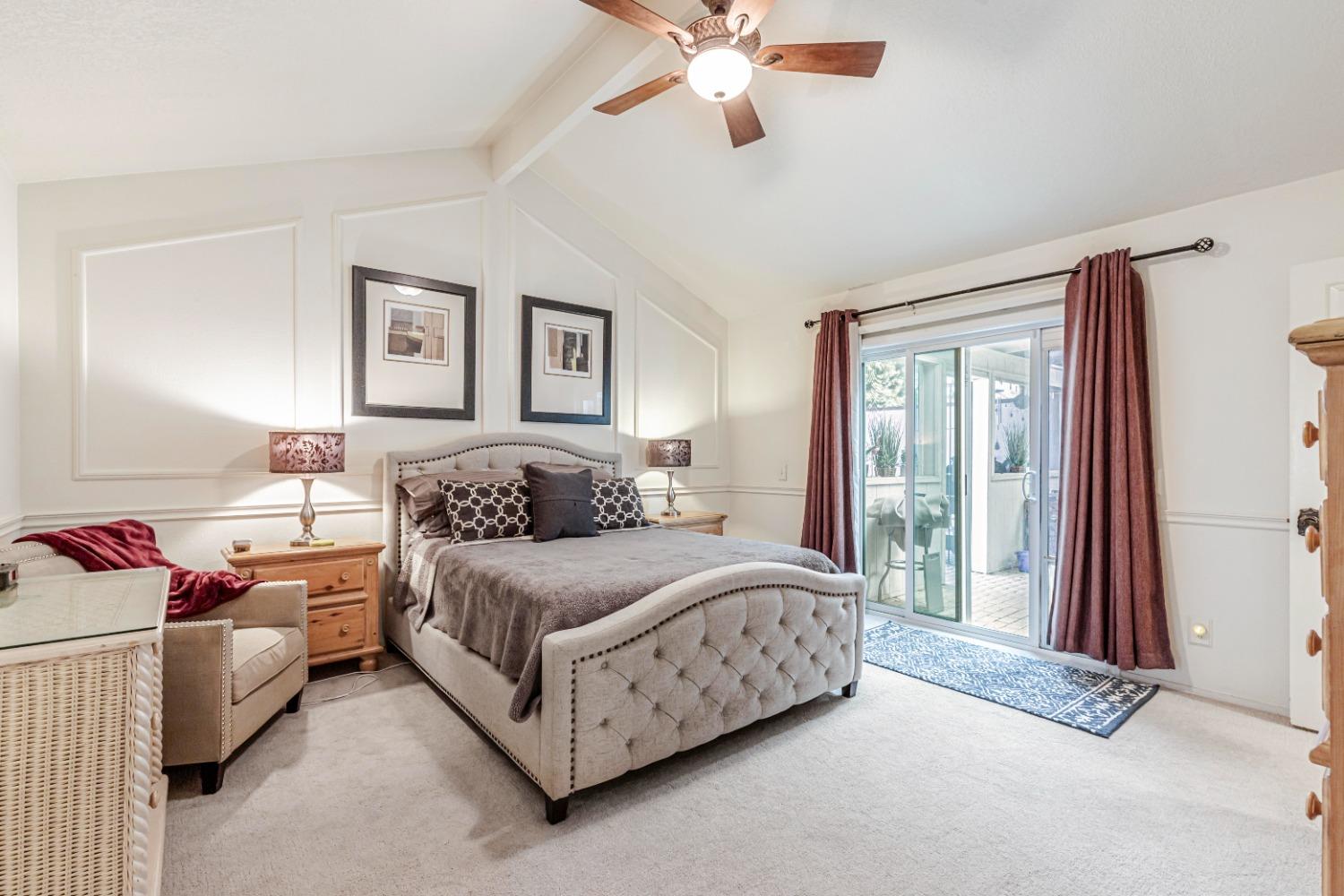 4 Seasons Court Madera, CA 93637 - Photo 7 of 18 a bedroom with a bed couch and window