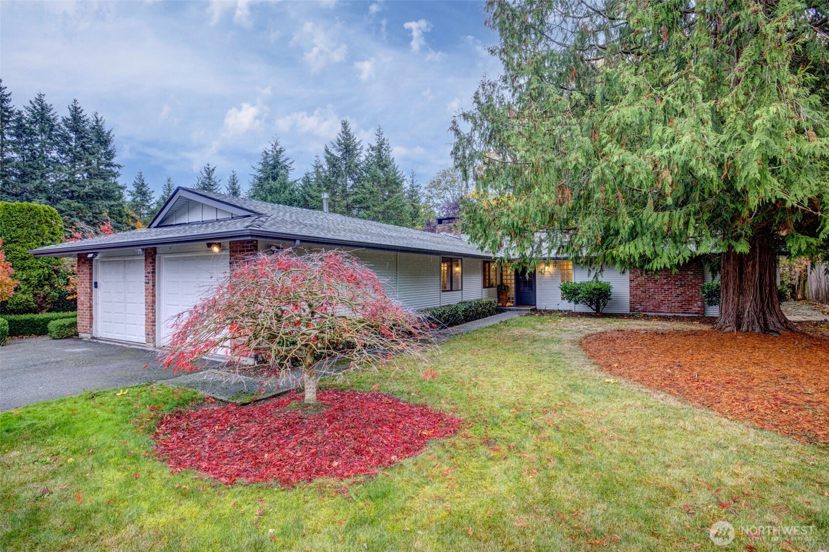 16123 Southeast 146th Place Renton, WA 98059 - Photo 2 of 40 a front view of a house with yard