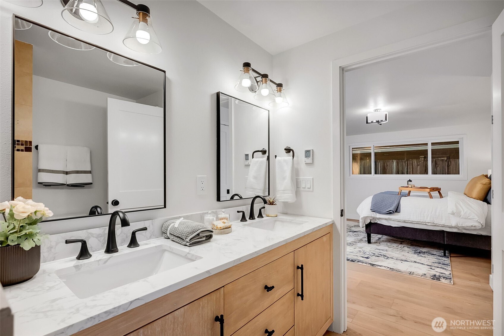 16123 Southeast 146th Place Renton, WA 98059 - Photo 30 of 40 a bathroom with a double vanity sink and a mirror